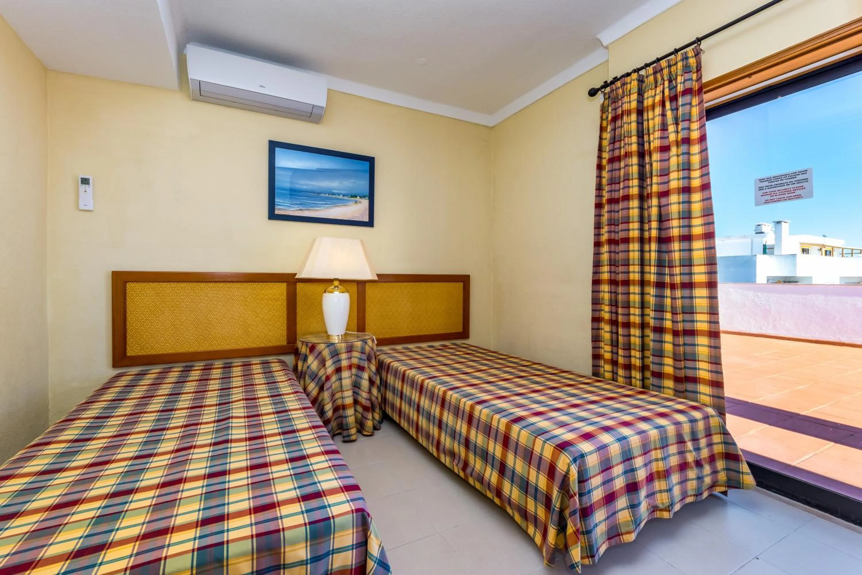 Bed in Janelas do Mar Apartamentos Turisticos