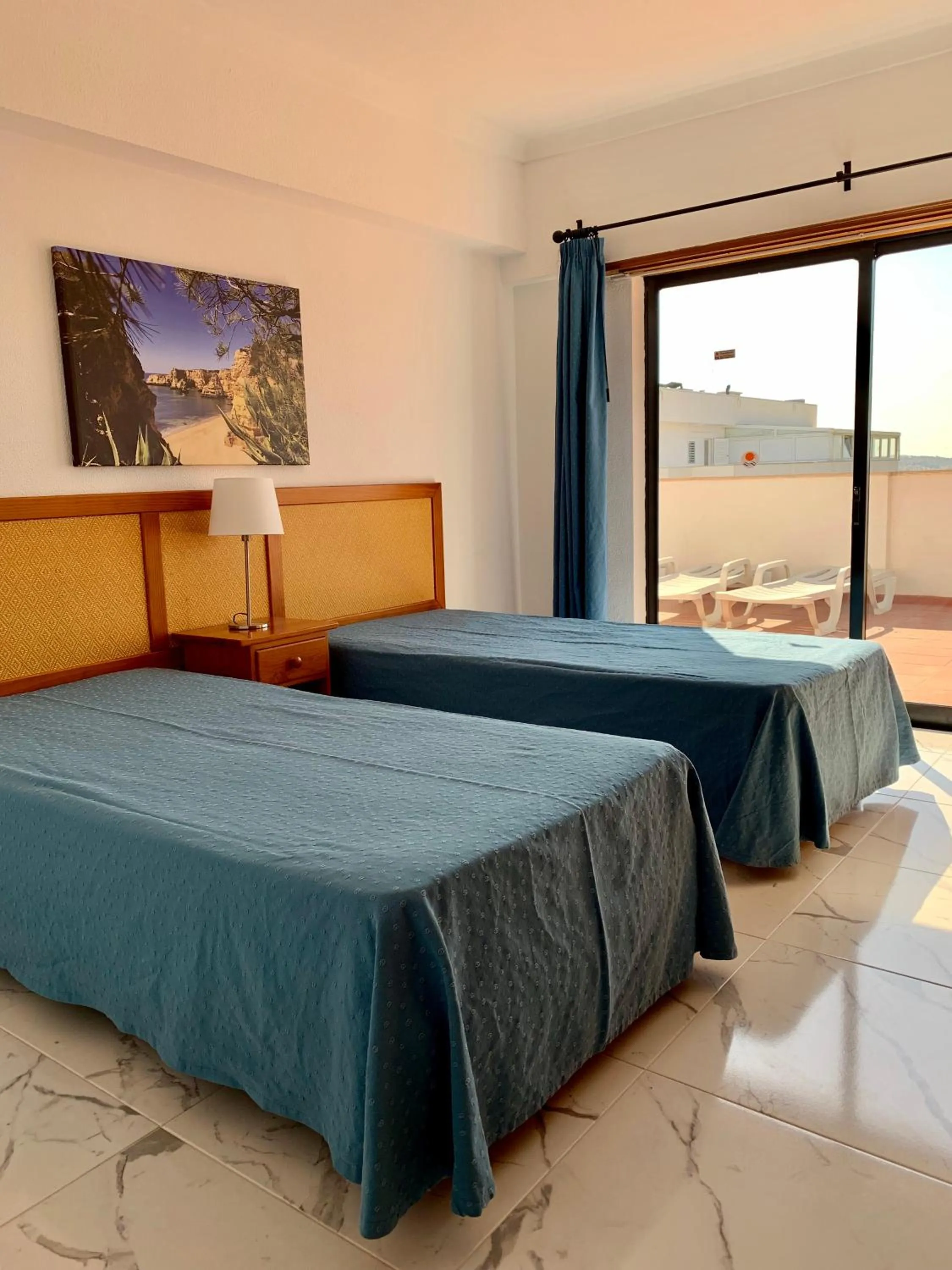 Bed in Janelas do Mar Apartamentos Turisticos