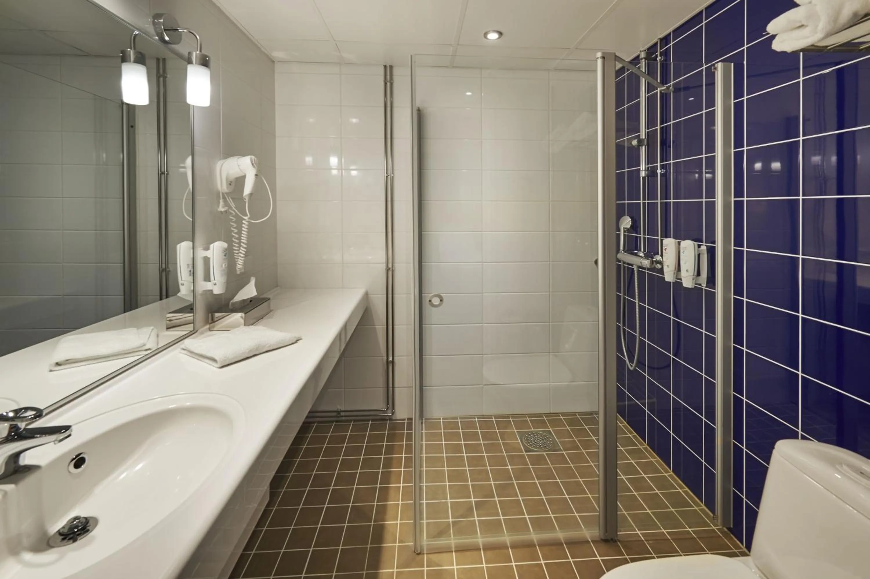 Bathroom in Holiday Inn Tampere - Central Station by IHG