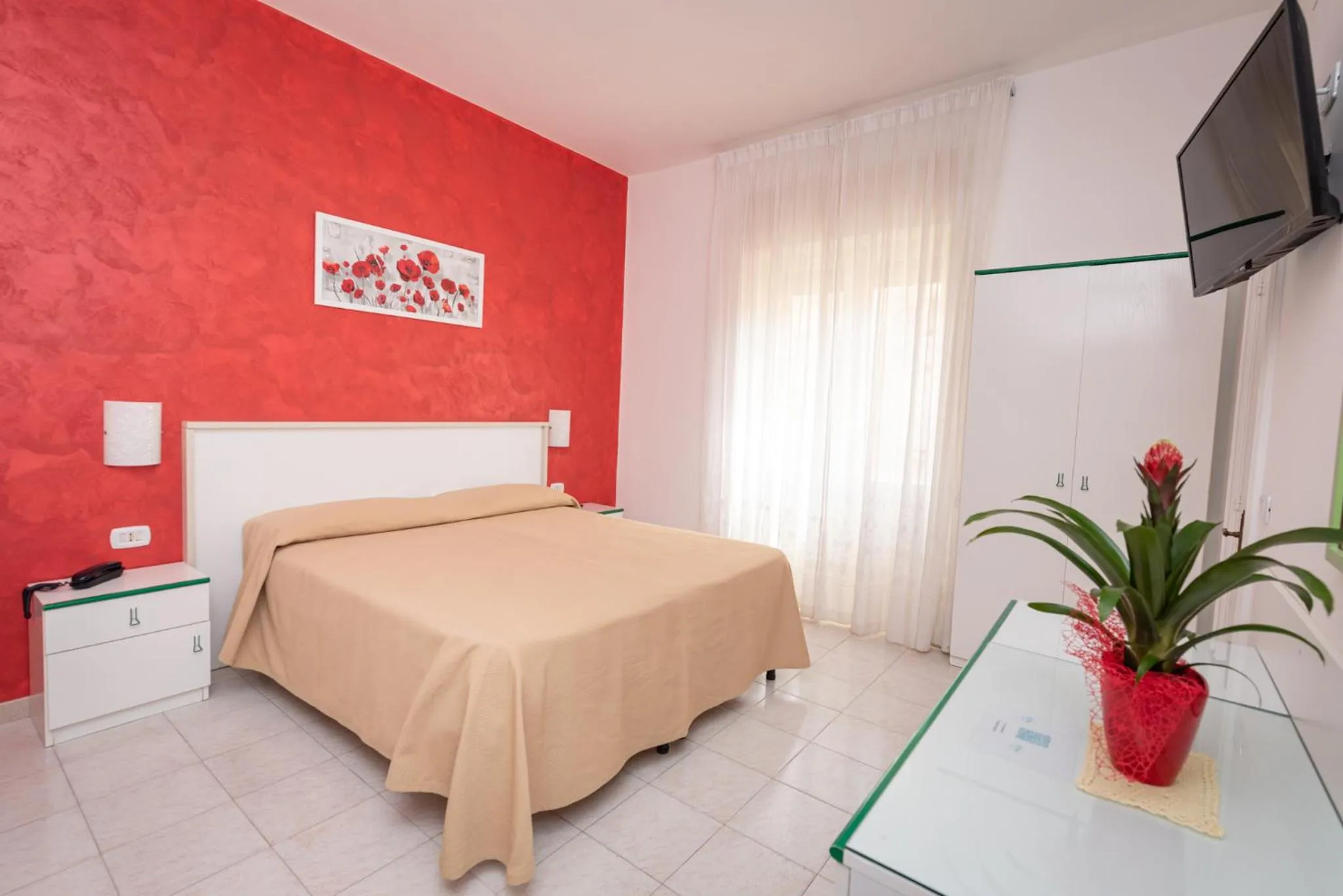 Bed in Hotel Baia Verde