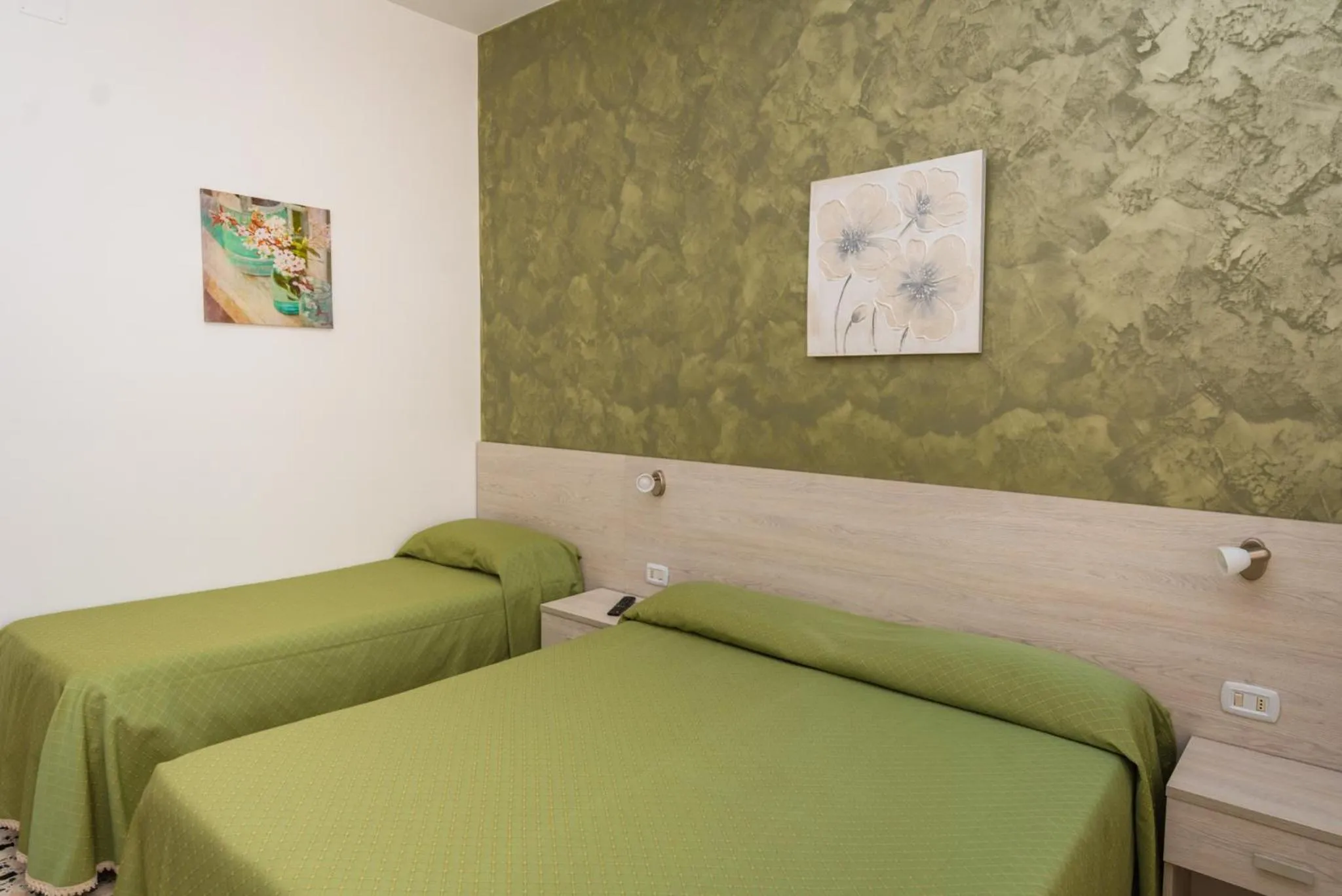 Bed in Hotel Baia Verde