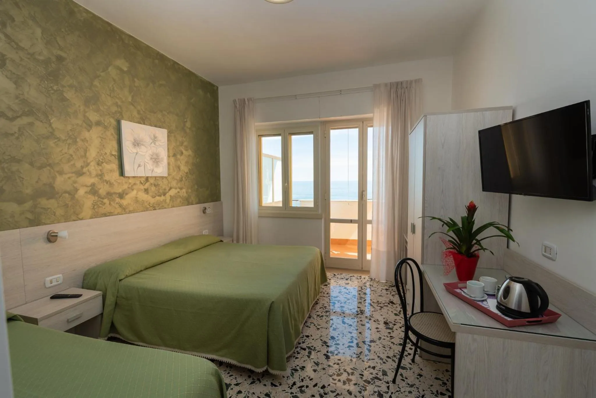 Bed in Hotel Baia Verde