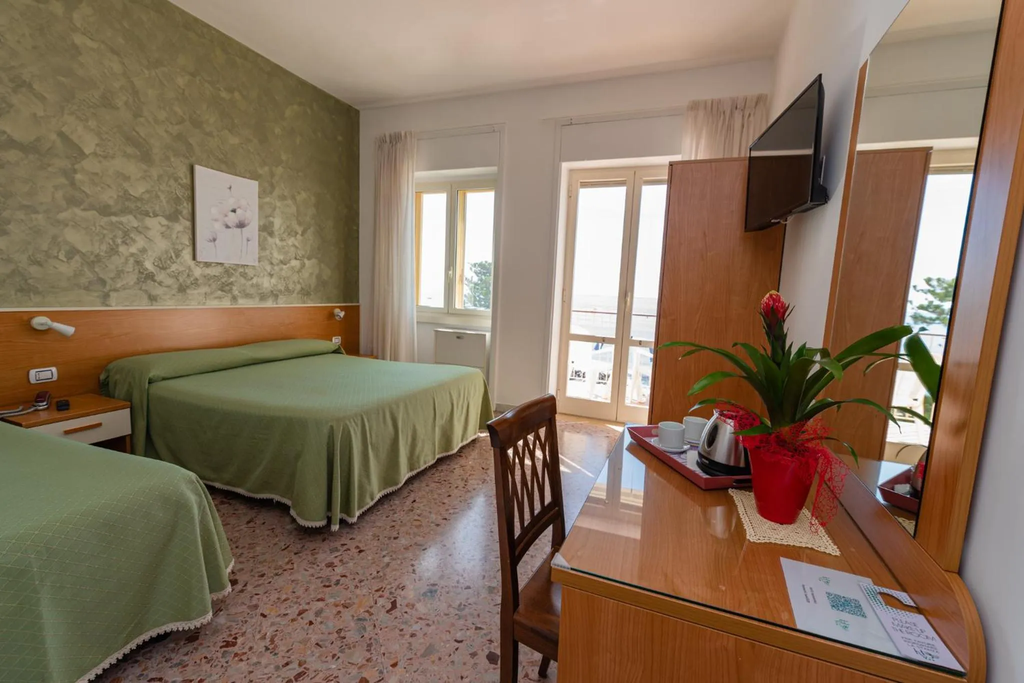 Bed in Hotel Baia Verde
