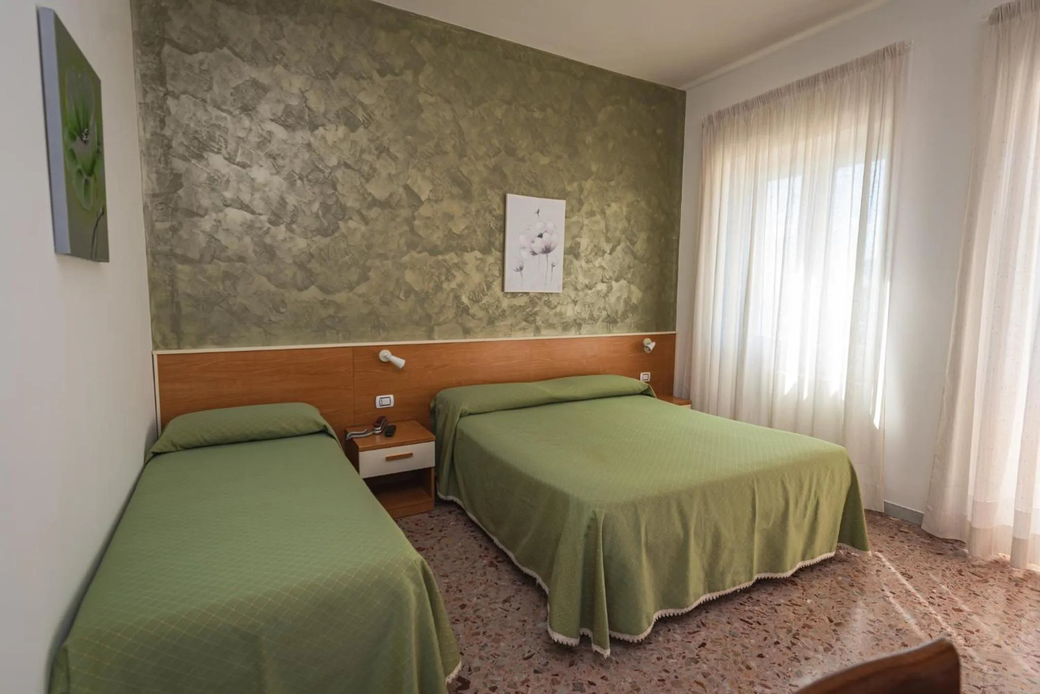 Bed in Hotel Baia Verde