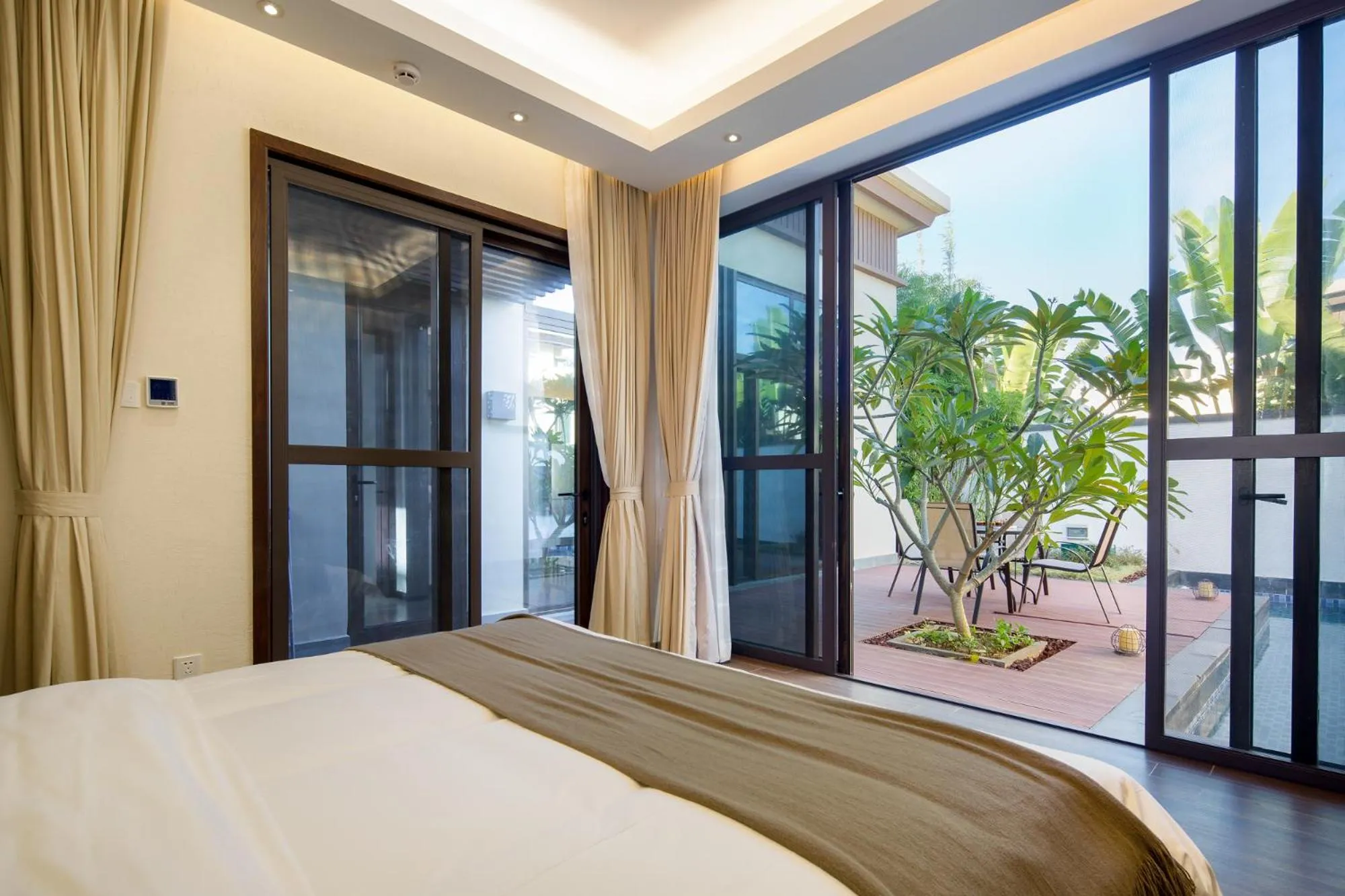 Bed in Sanya Haitang Bay Mushe Villa