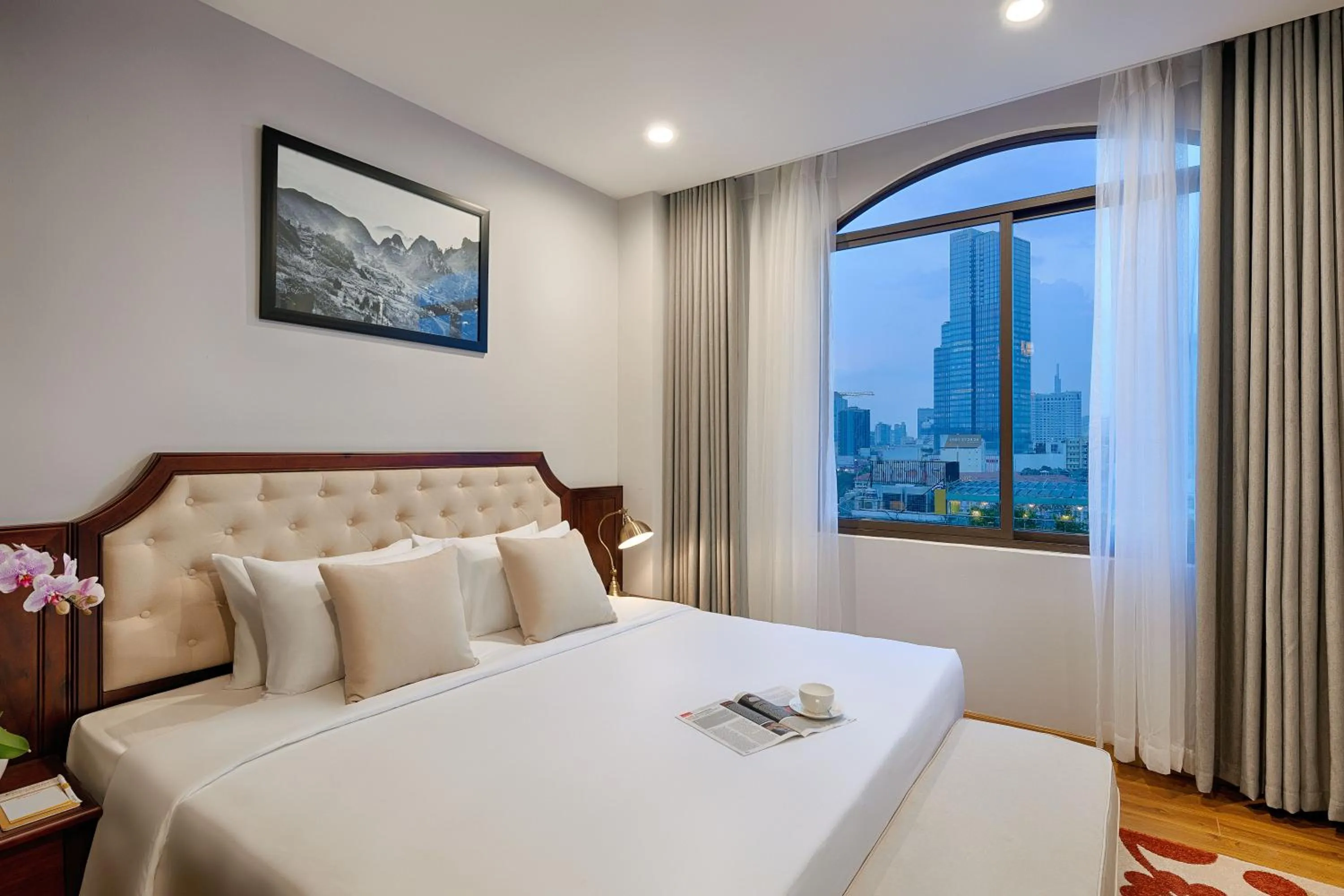 Bed in Happy Life Grand Hotel & Rooftop Skybar