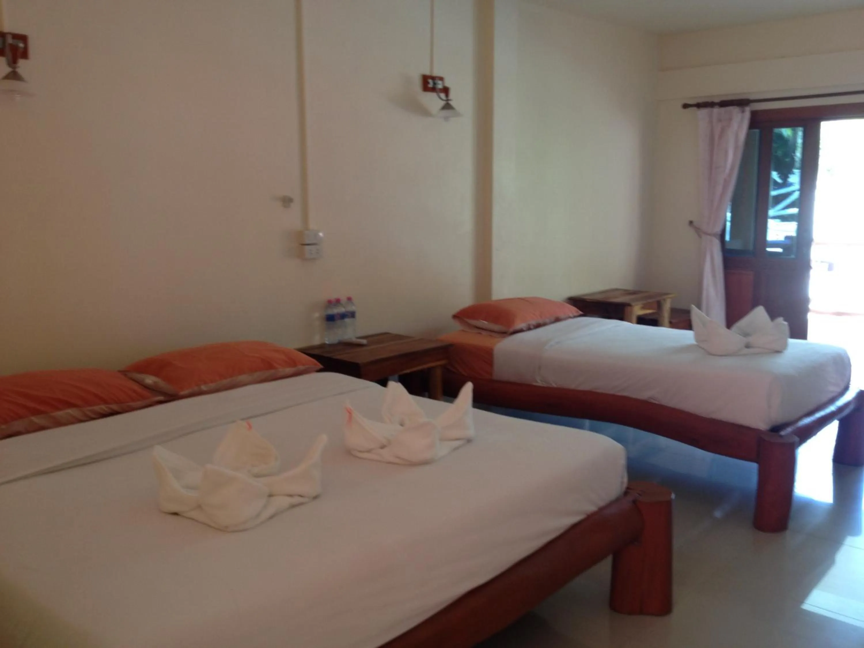 Bed in Paradise Bungalows