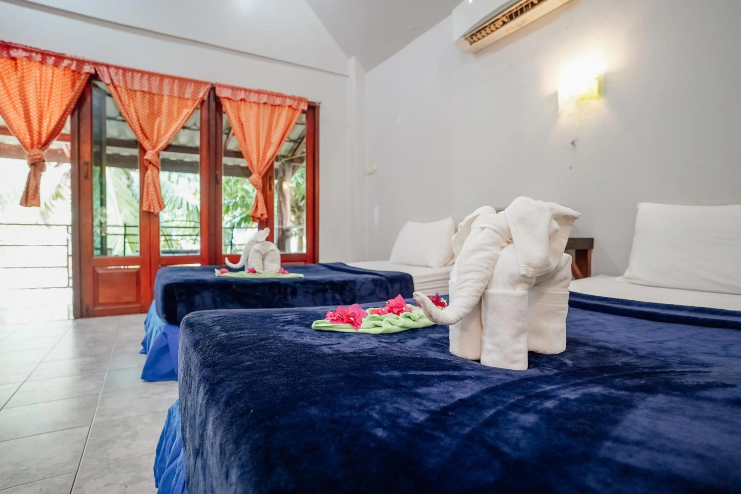 Bed in Paradise Bungalows