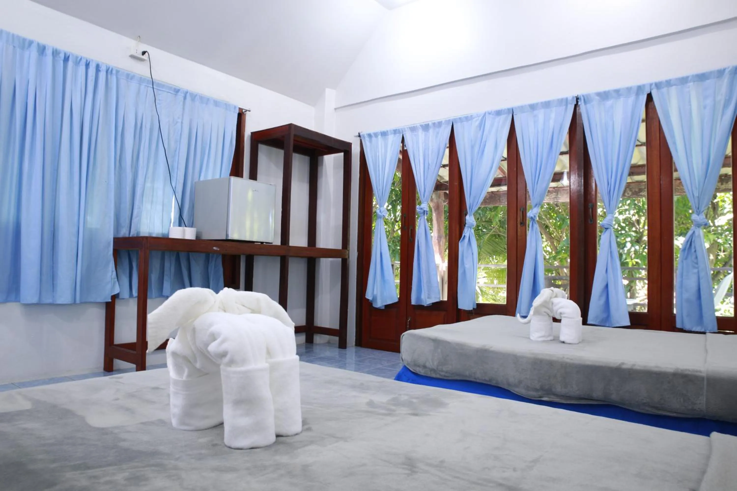 Bed in Paradise Bungalows