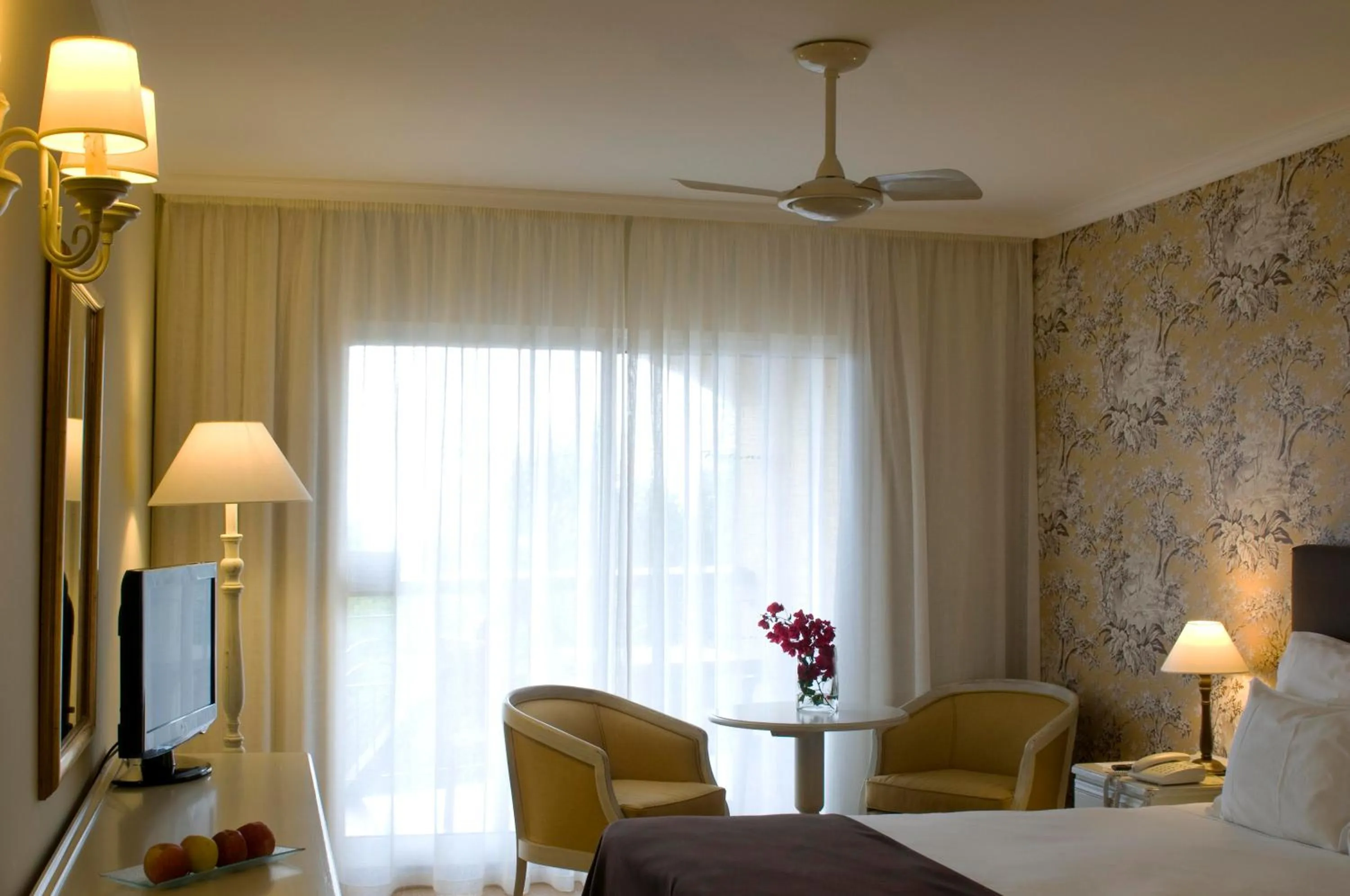 Photo of the whole room, Bed in Pestana Village Garden Hotel