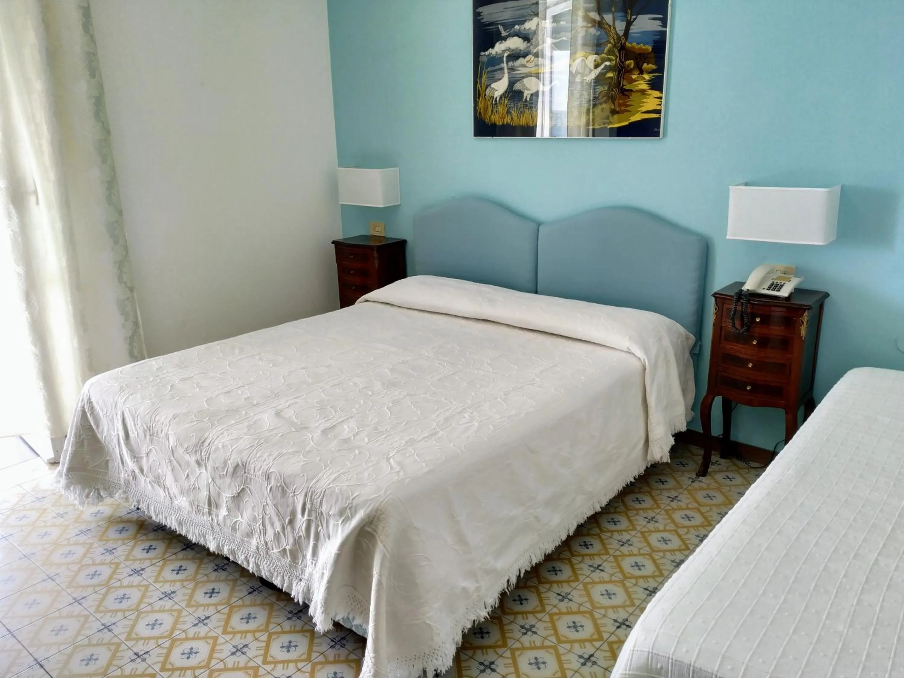 Bed in Hotel La Scogliera