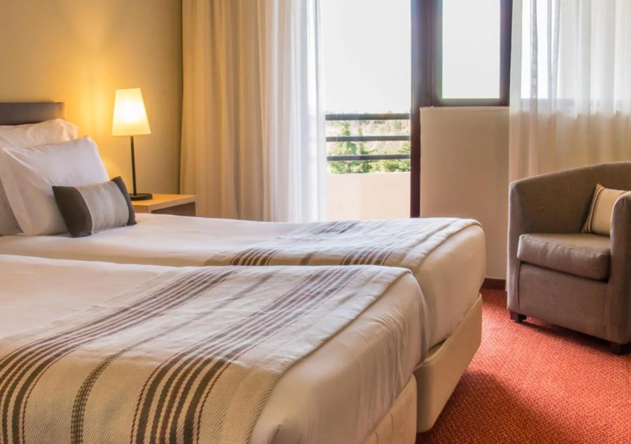 Bedroom, Bed in Evora Hotel