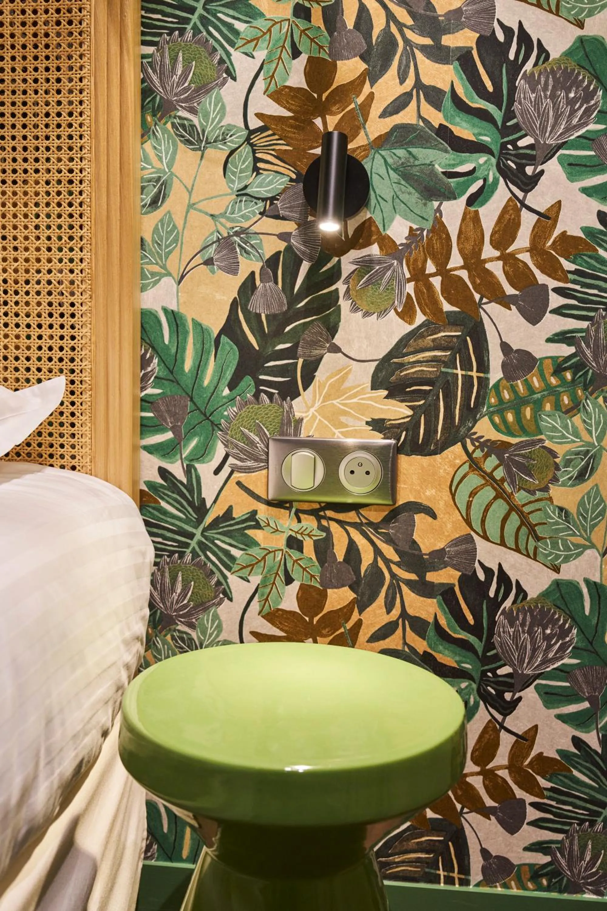 Decorative detail, Bed in Hôtel le Corbusson Laval Ouest