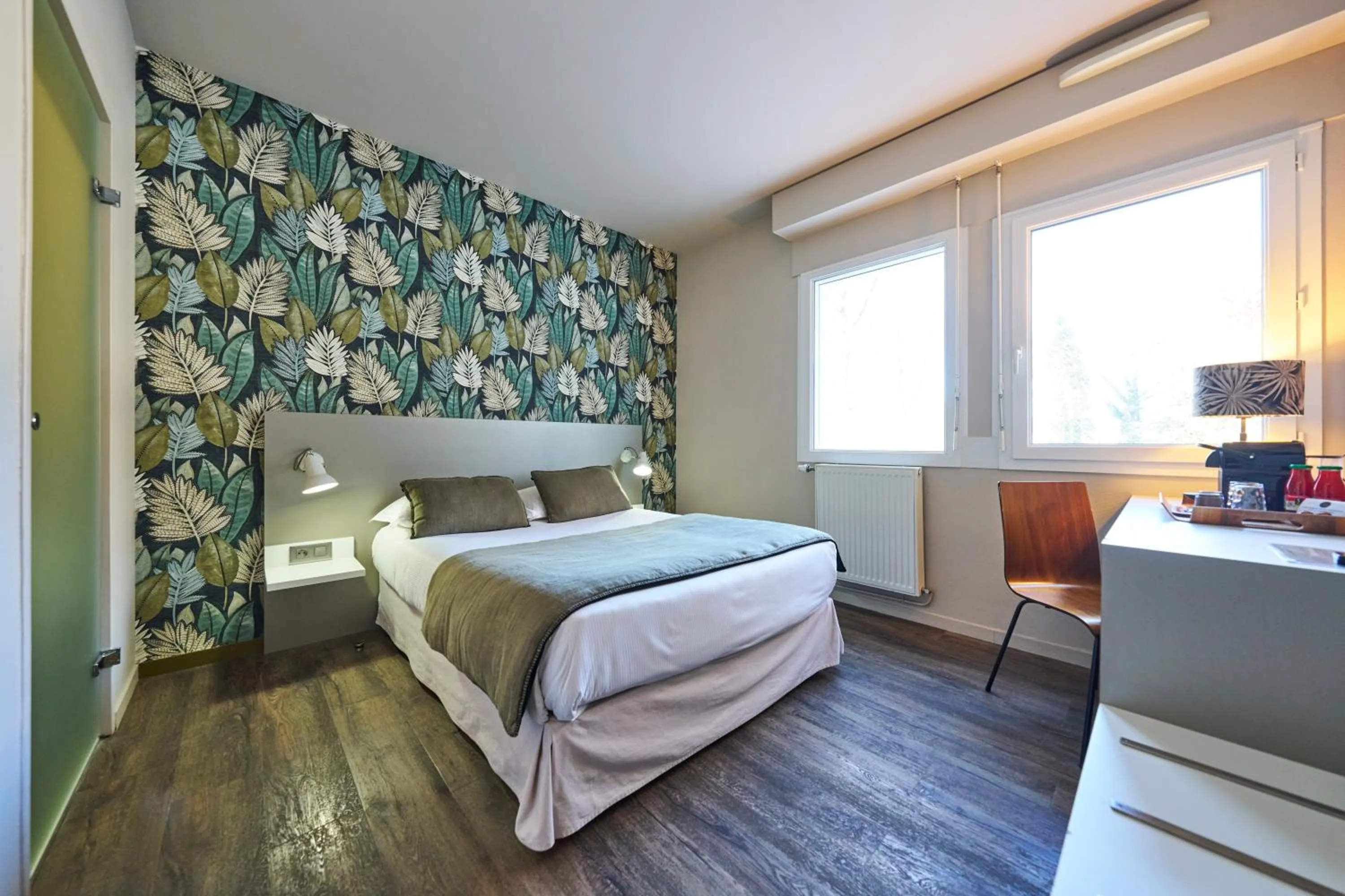 Photo of the whole room, Bed in Hôtel le Corbusson Laval Ouest