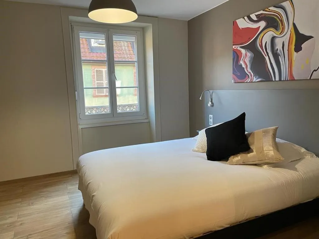 Bed in Hotel-Restaurant St-Christophe