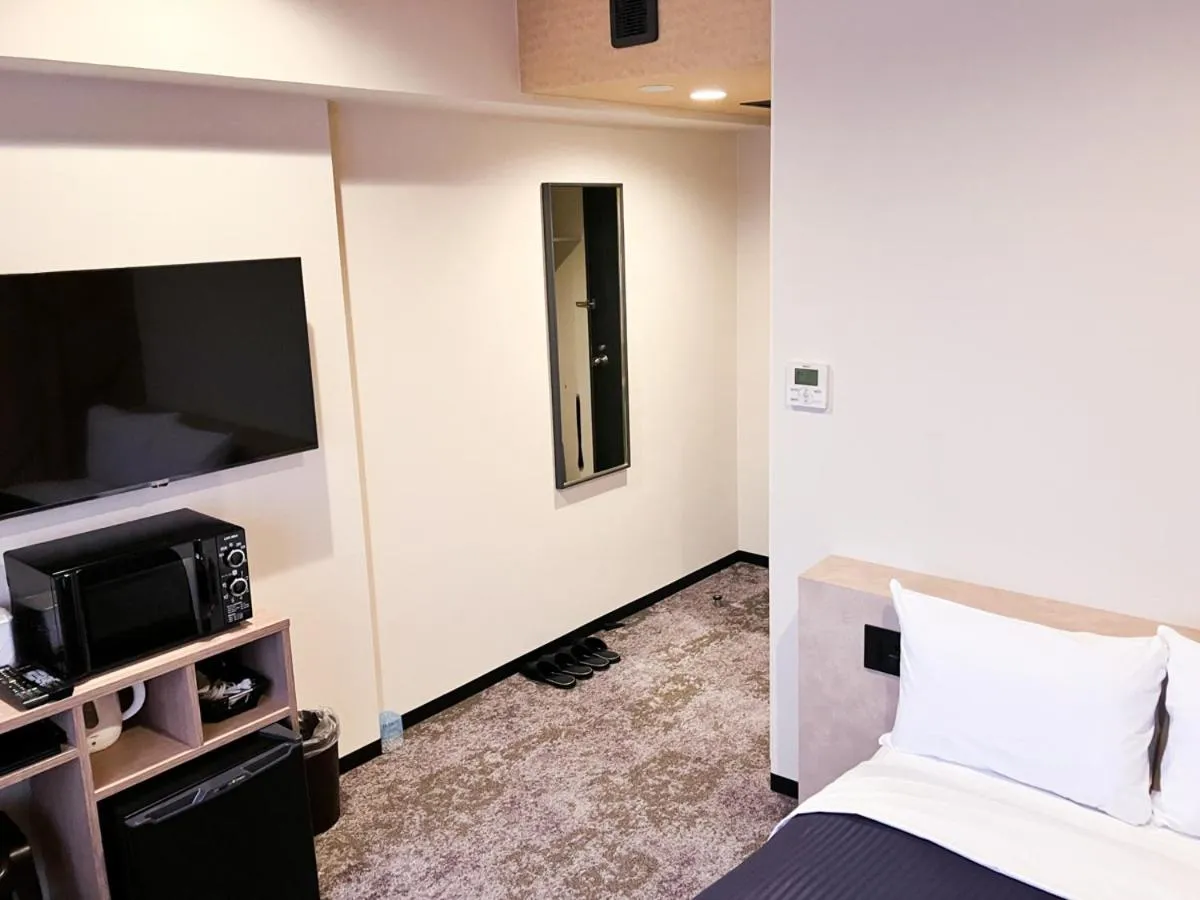 Photo of the whole room, Bed in HOTEL LiVEMAX BUDGET Kagoshima