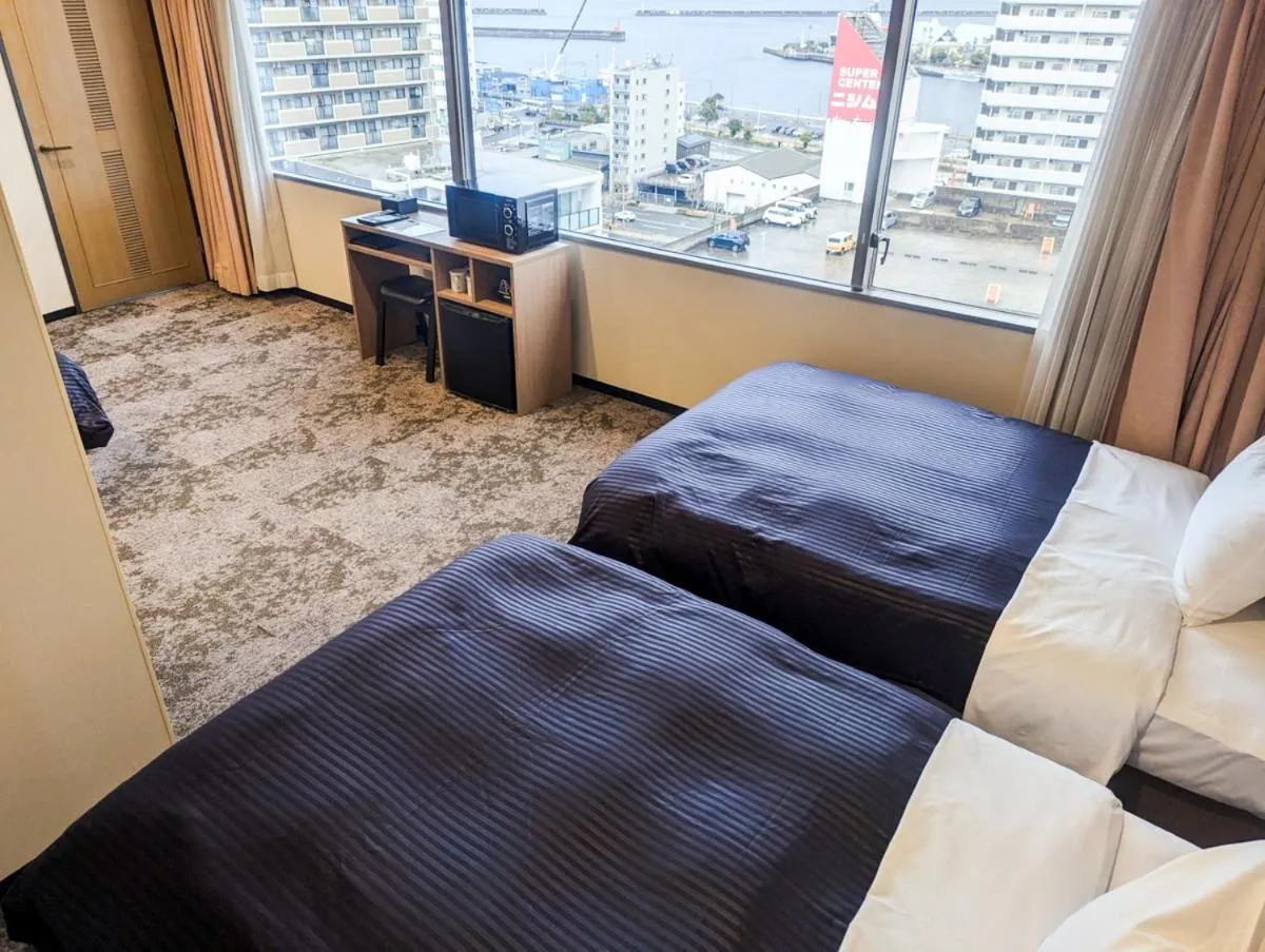 Bed in HOTEL LiVEMAX BUDGET Kagoshima