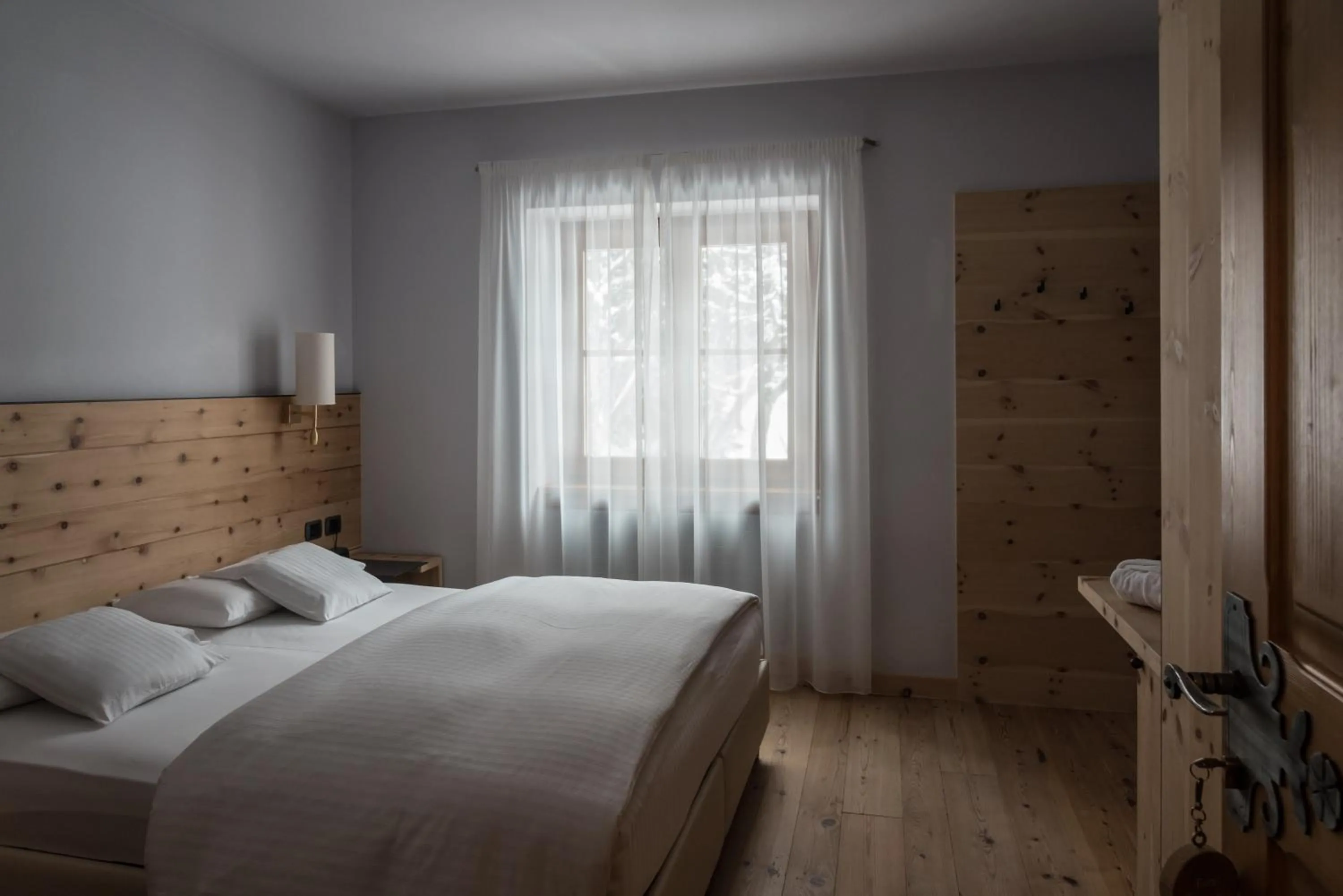 Bed in Chalet Laura Lodge Hotel