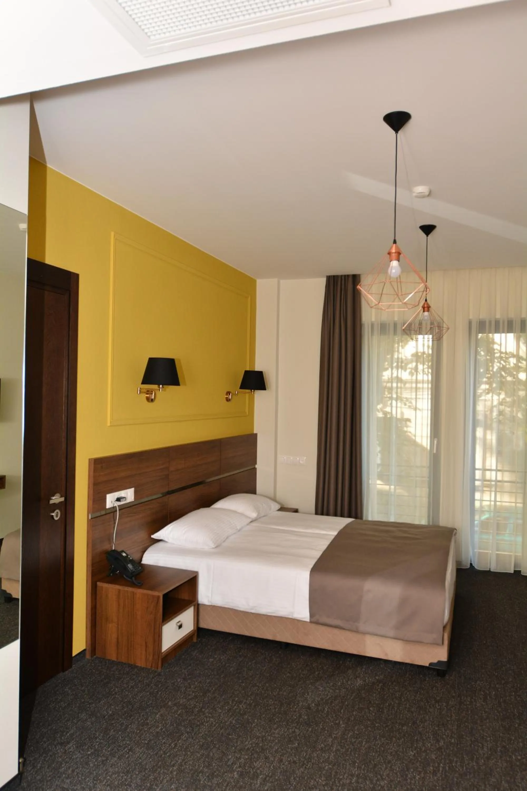 Bedroom, Bed in Hotel Garnet Tbilisi