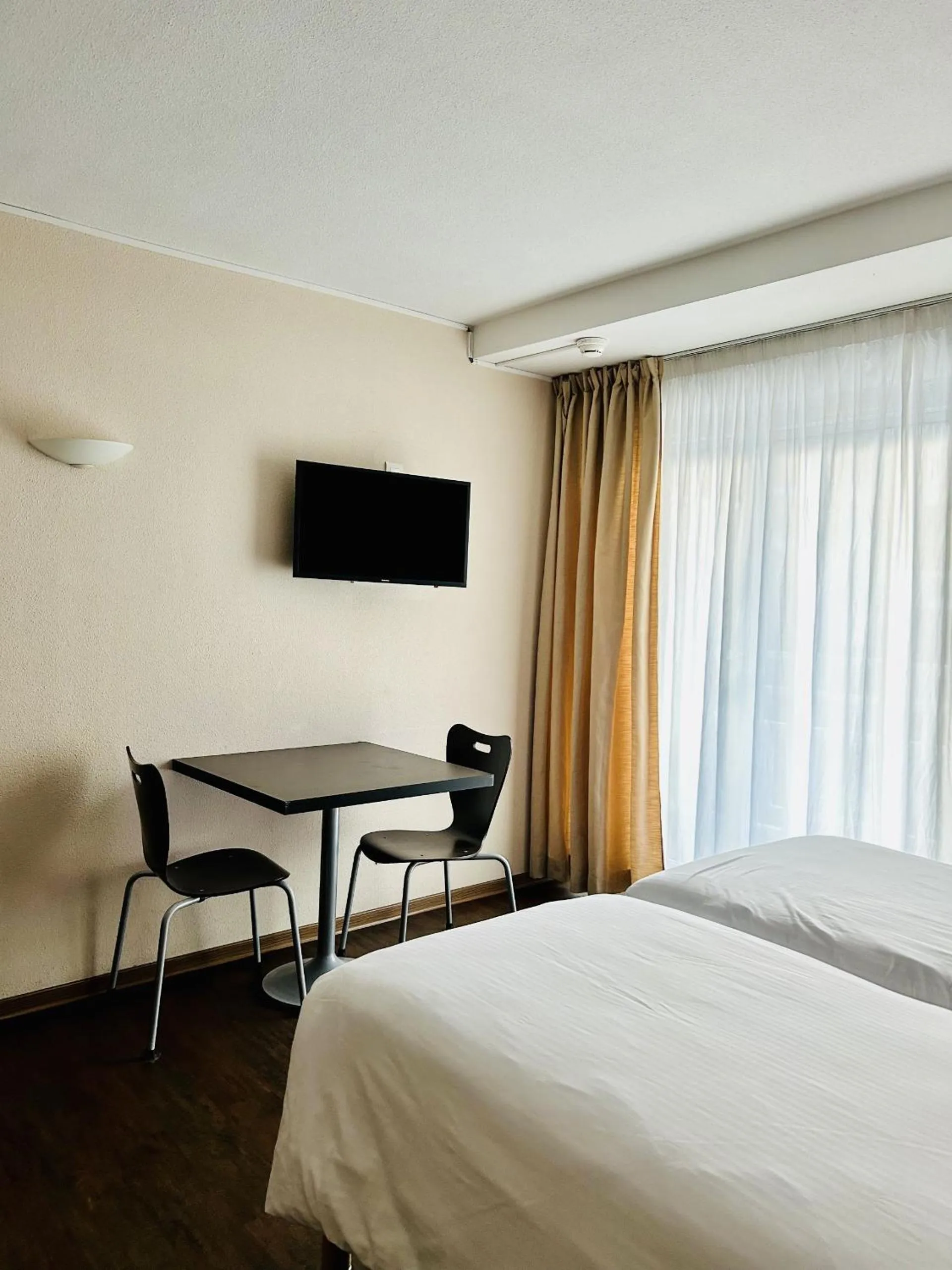 Seating area, Bed in Résidence Le Grand Tétras- SPA THERMAL INCLUS