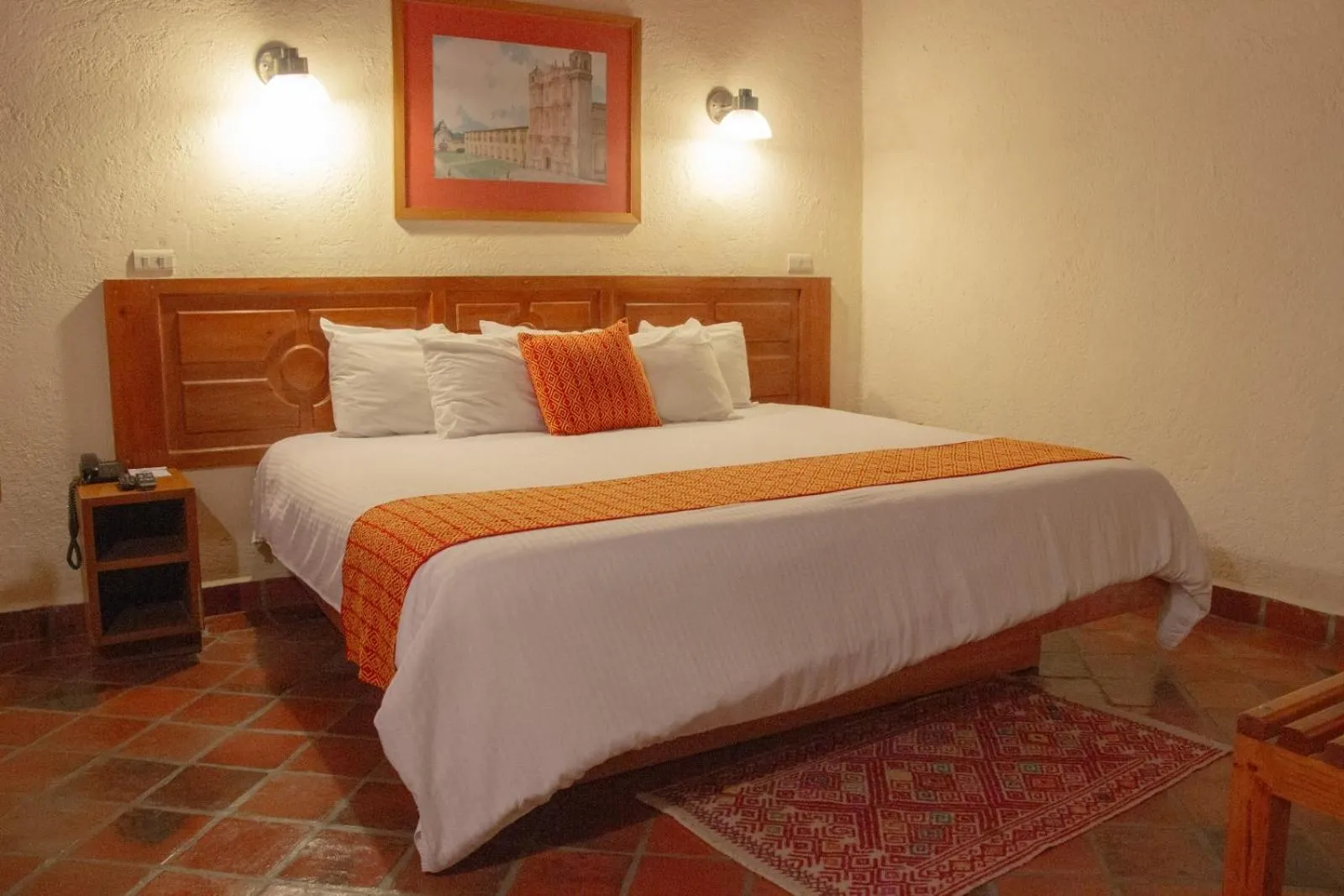 Bed in Hotel Diego de Mazariegos