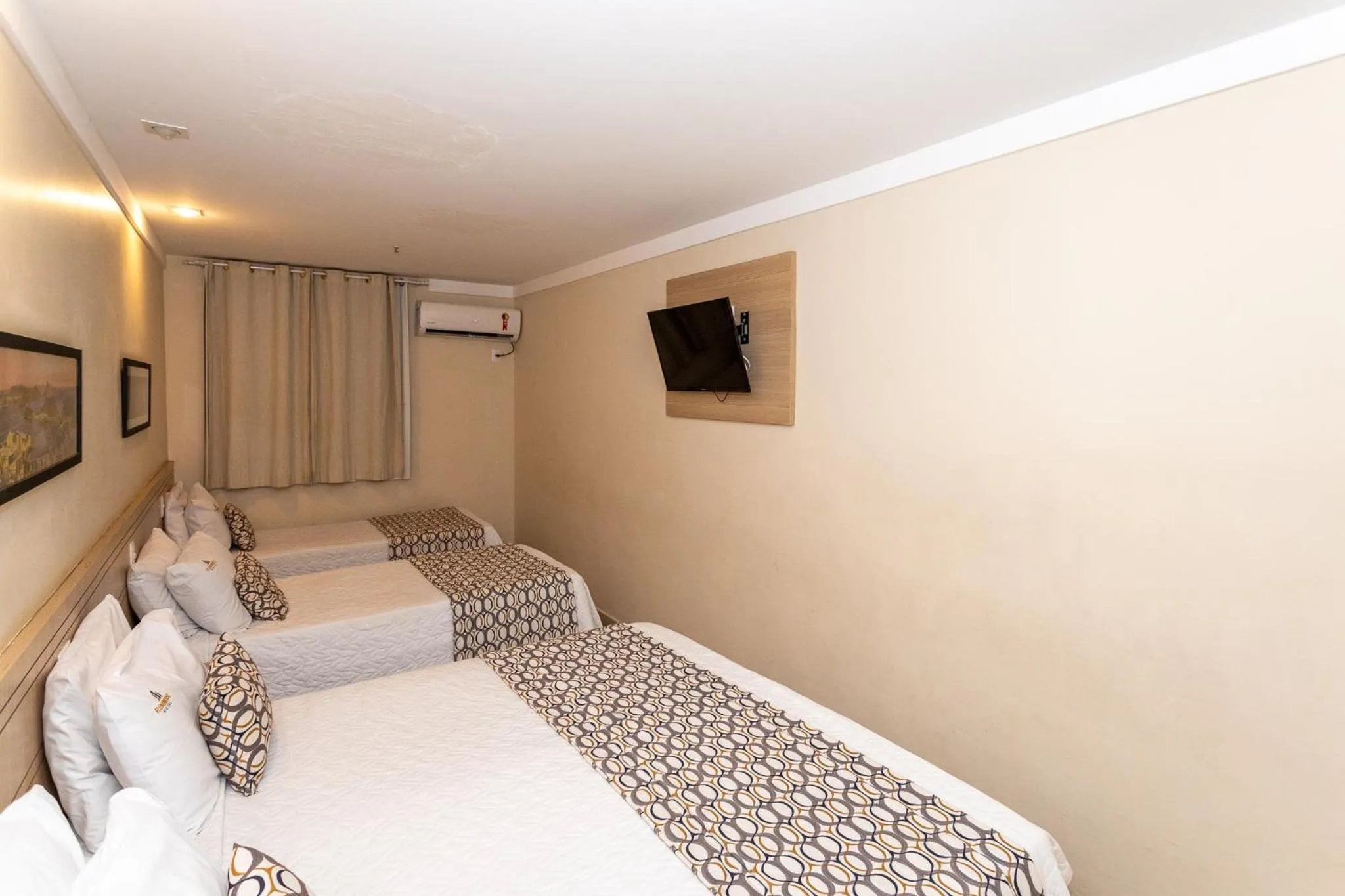 Bed in Fluminense Hotel