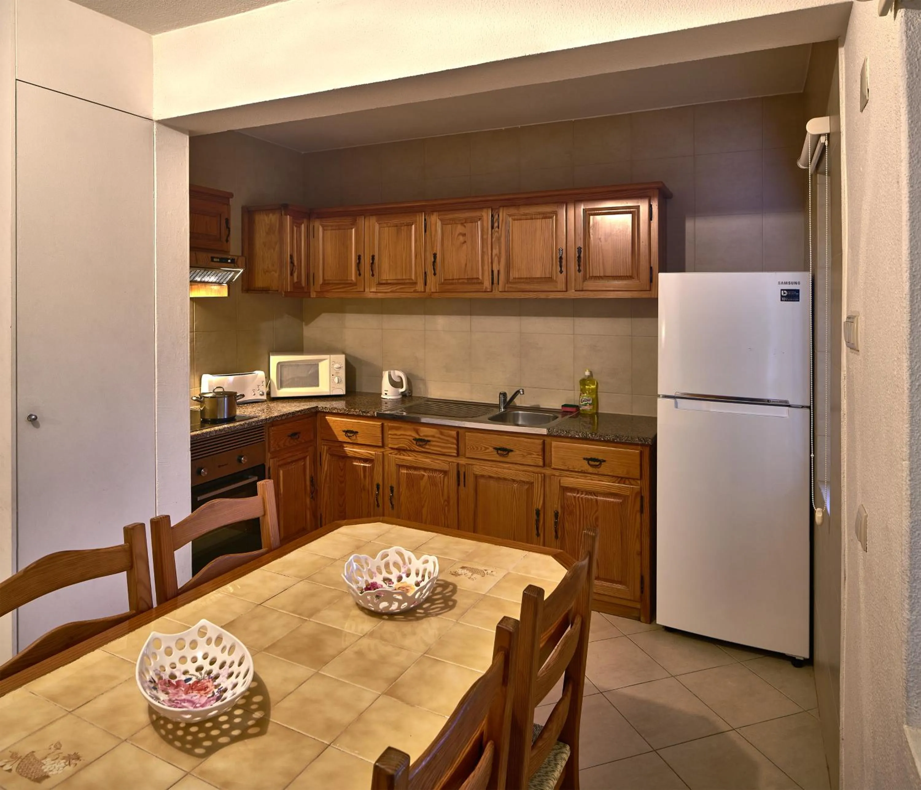 Kitchen or kitchenette in Parque Mourabel, Oásis Village & Pé do Lago