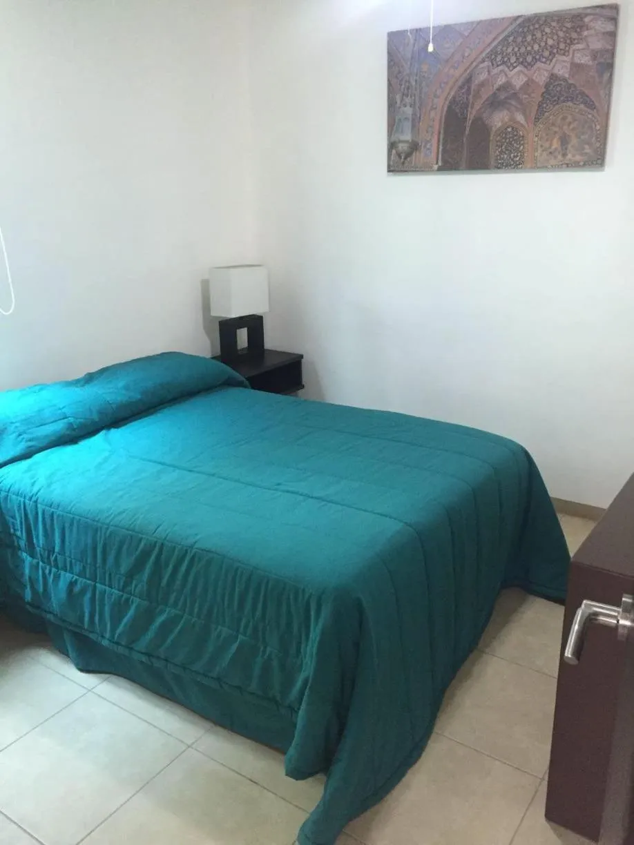 Bed in Zenharmony Suites