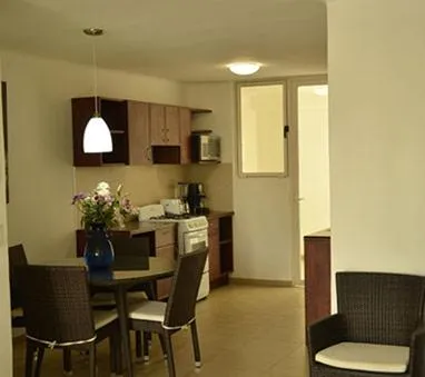 Kitchen or kitchenette in Zenharmony Suites