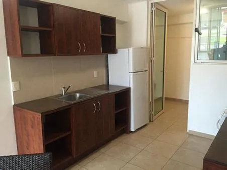 Kitchen or kitchenette in Zenharmony Suites