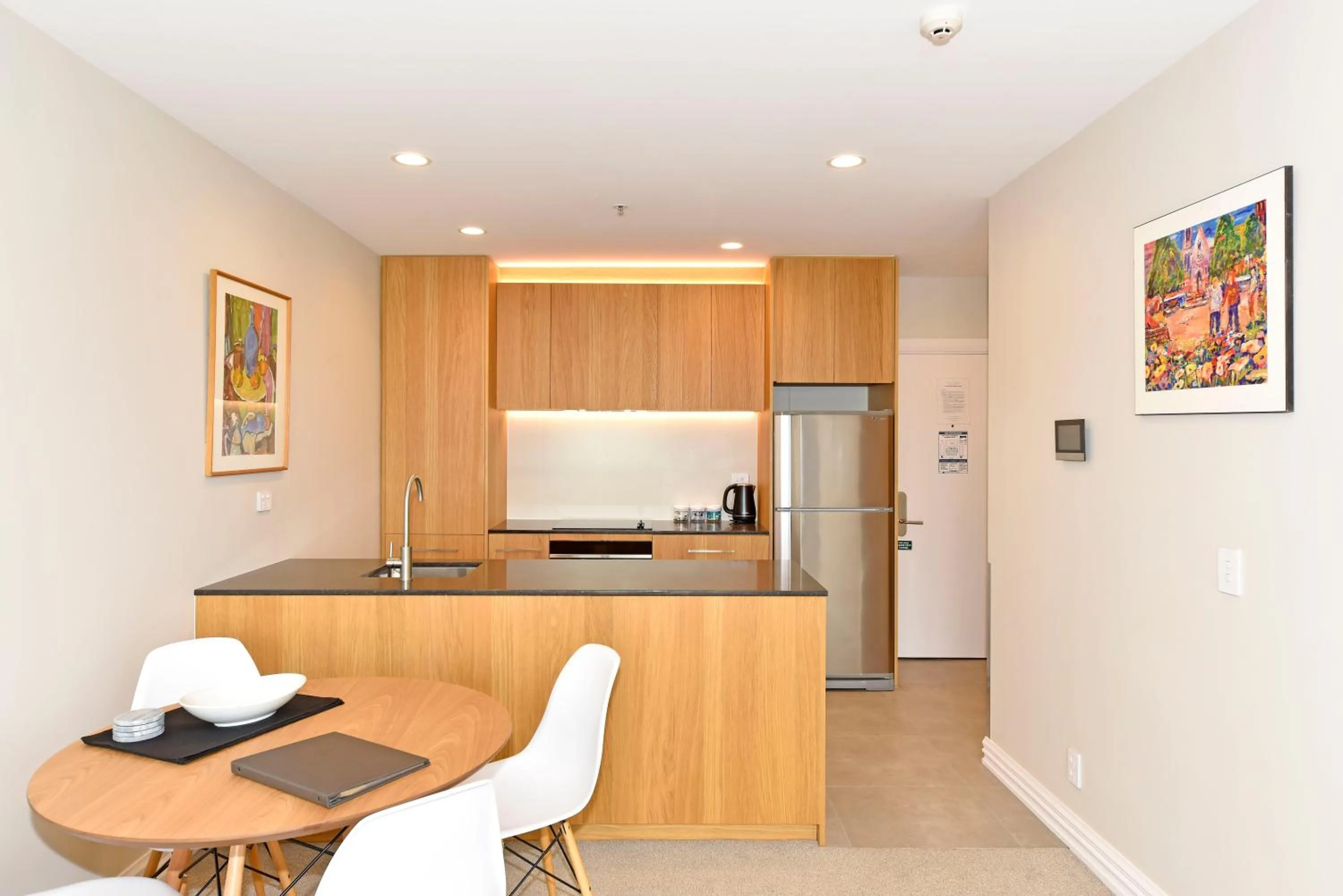 Kitchen or kitchenette in West Fitzroy Apartments