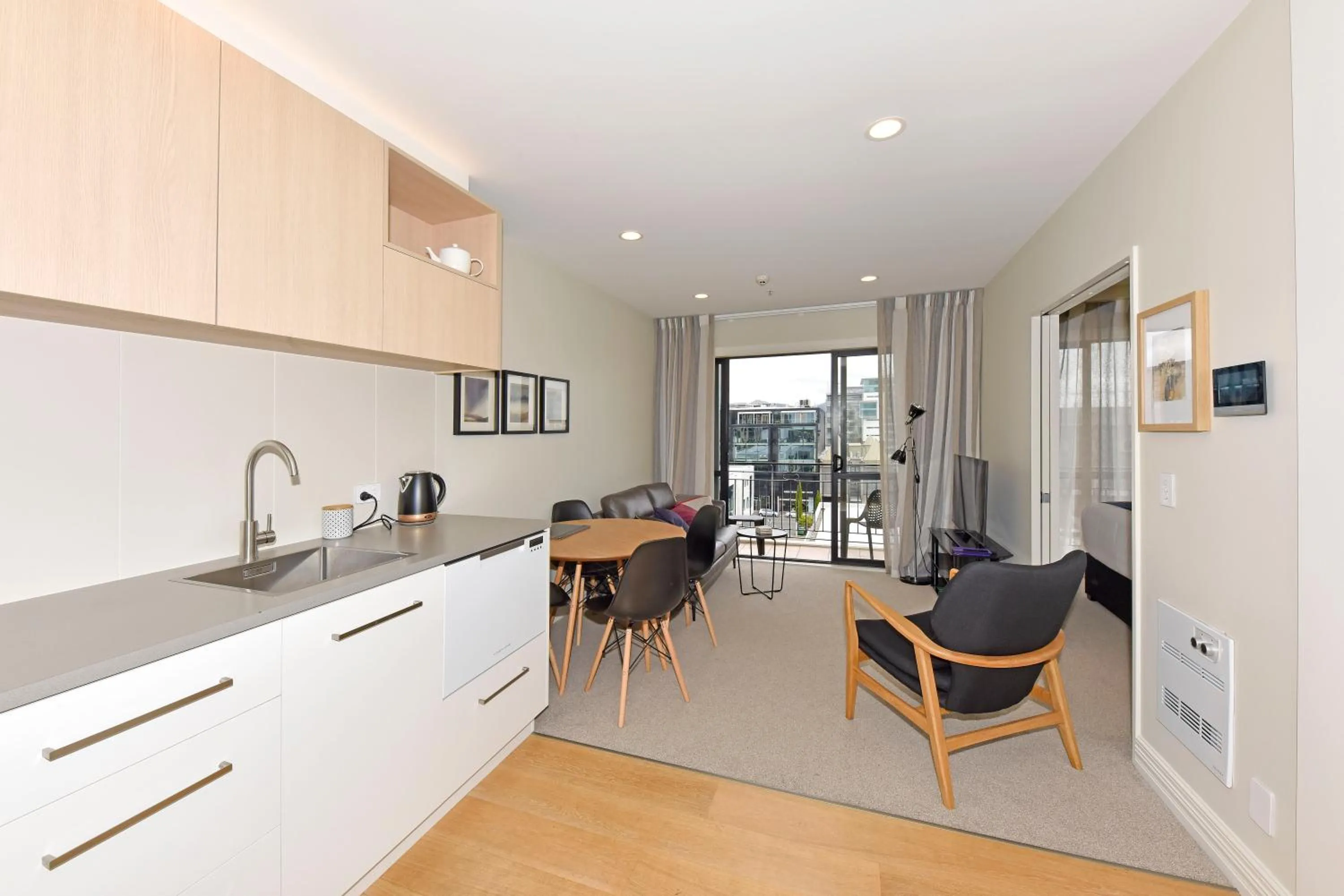 Kitchen or kitchenette in West Fitzroy Apartments