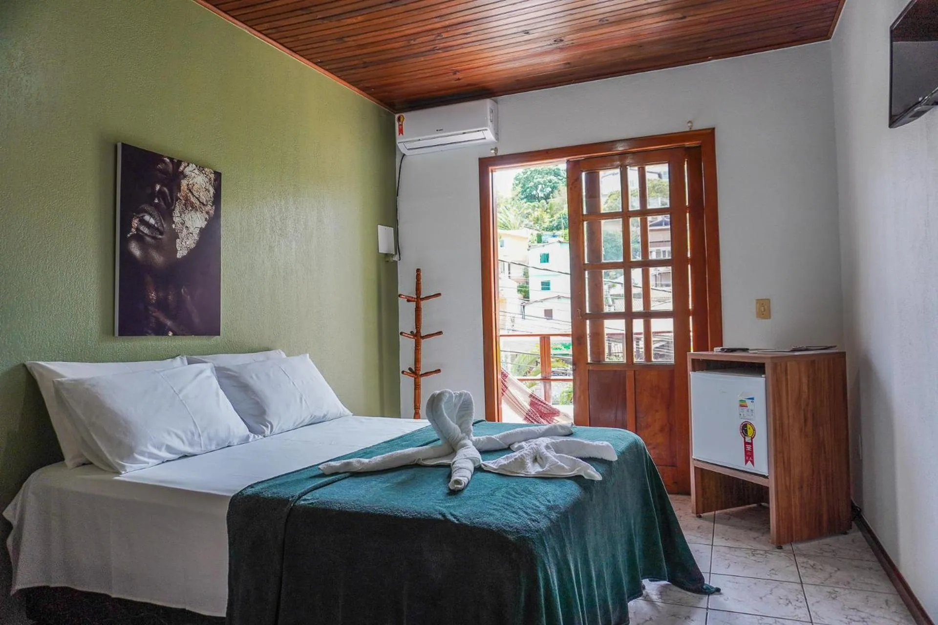 Bed in Pousada da praça