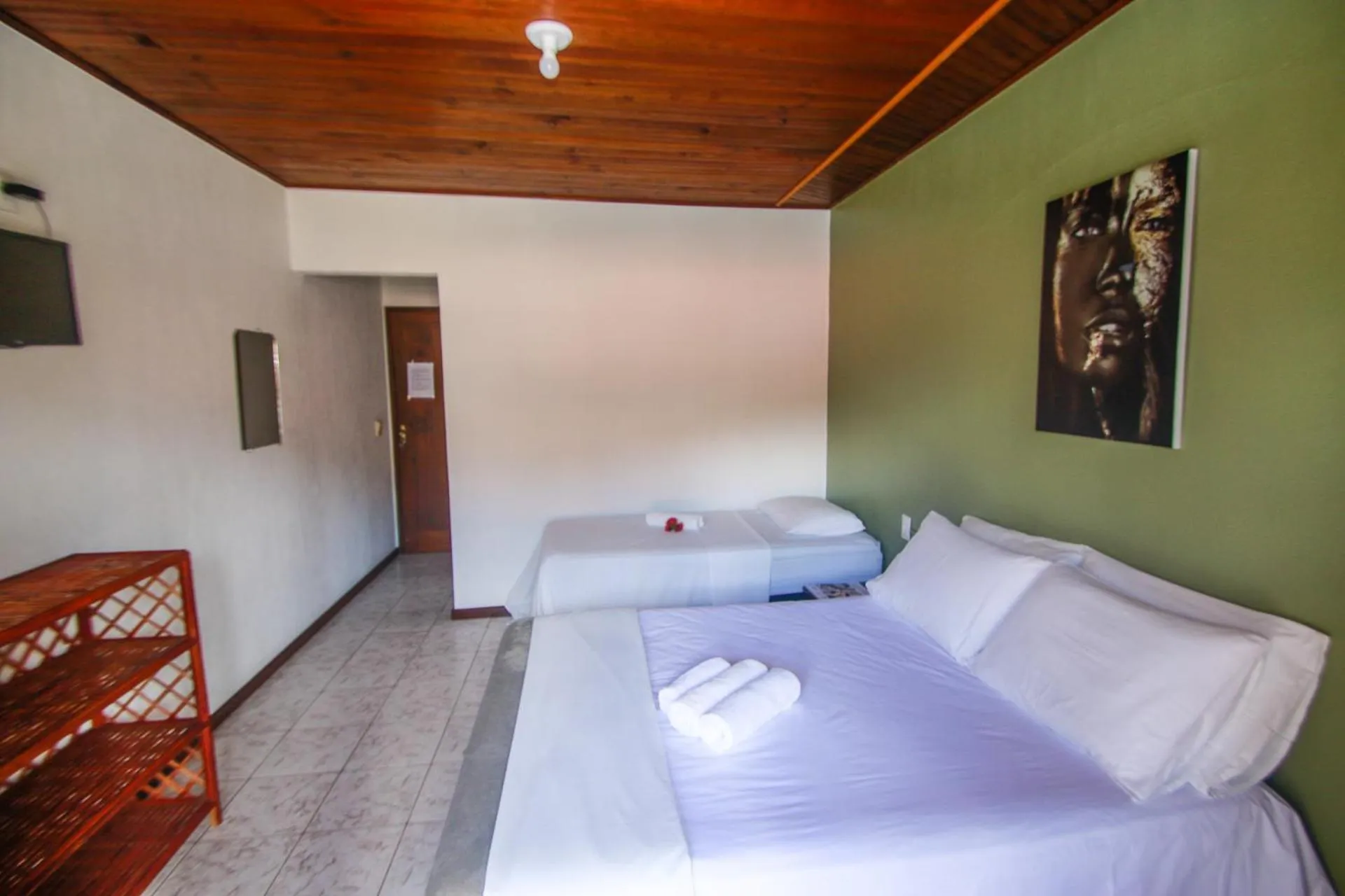 Bed in Pousada da praça