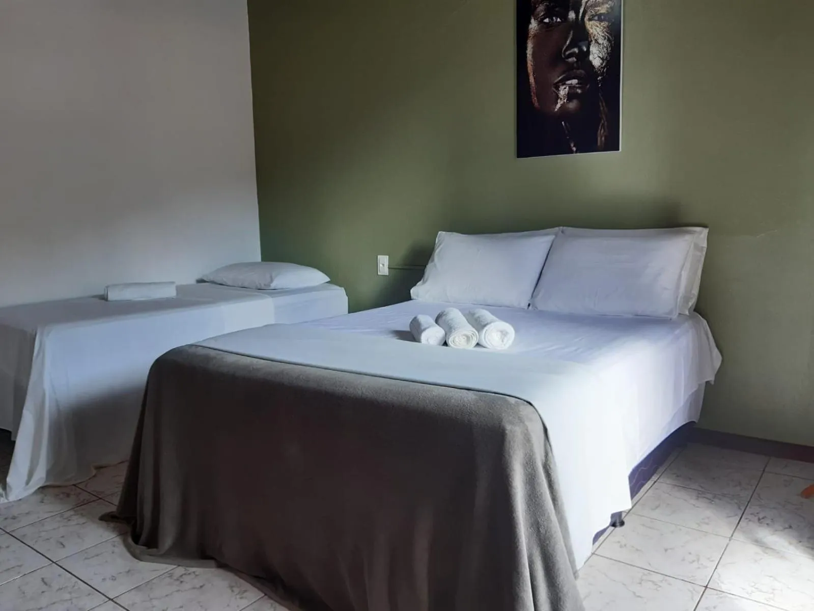 Bed in Pousada da praça