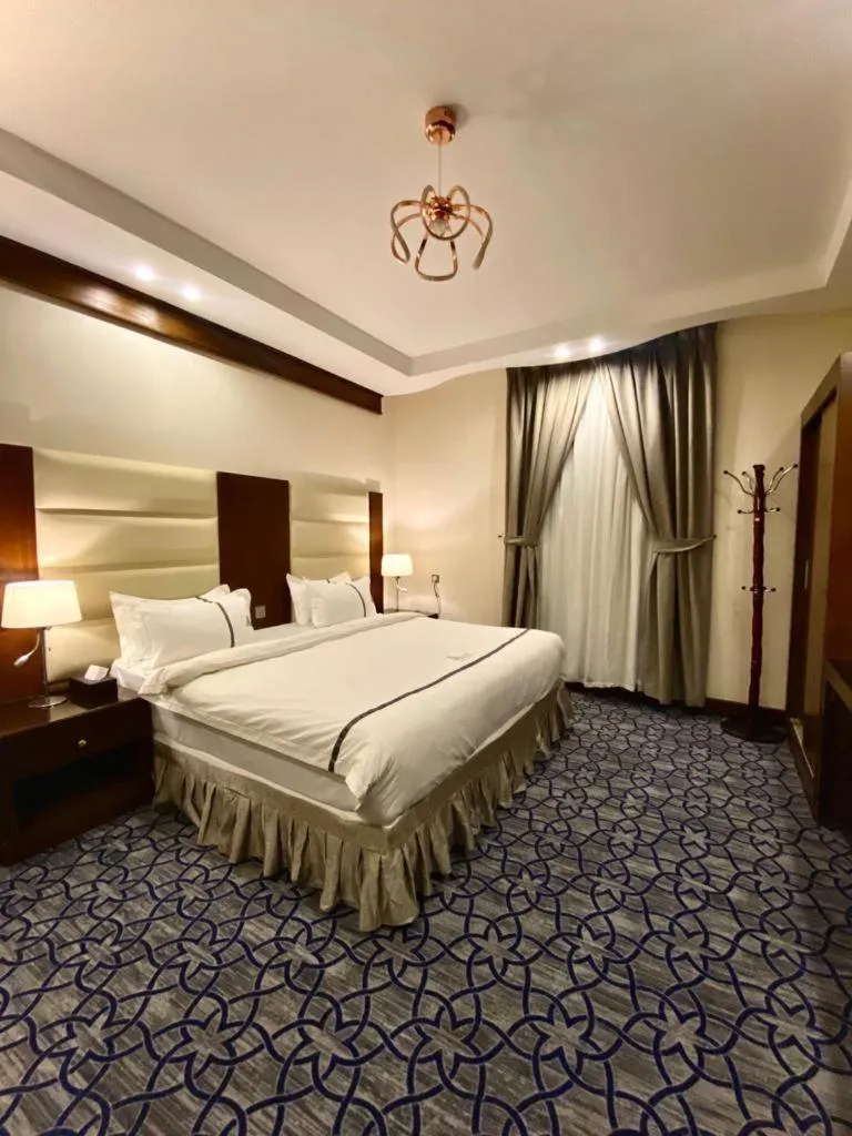 Bed in Aral Hotel Apartments