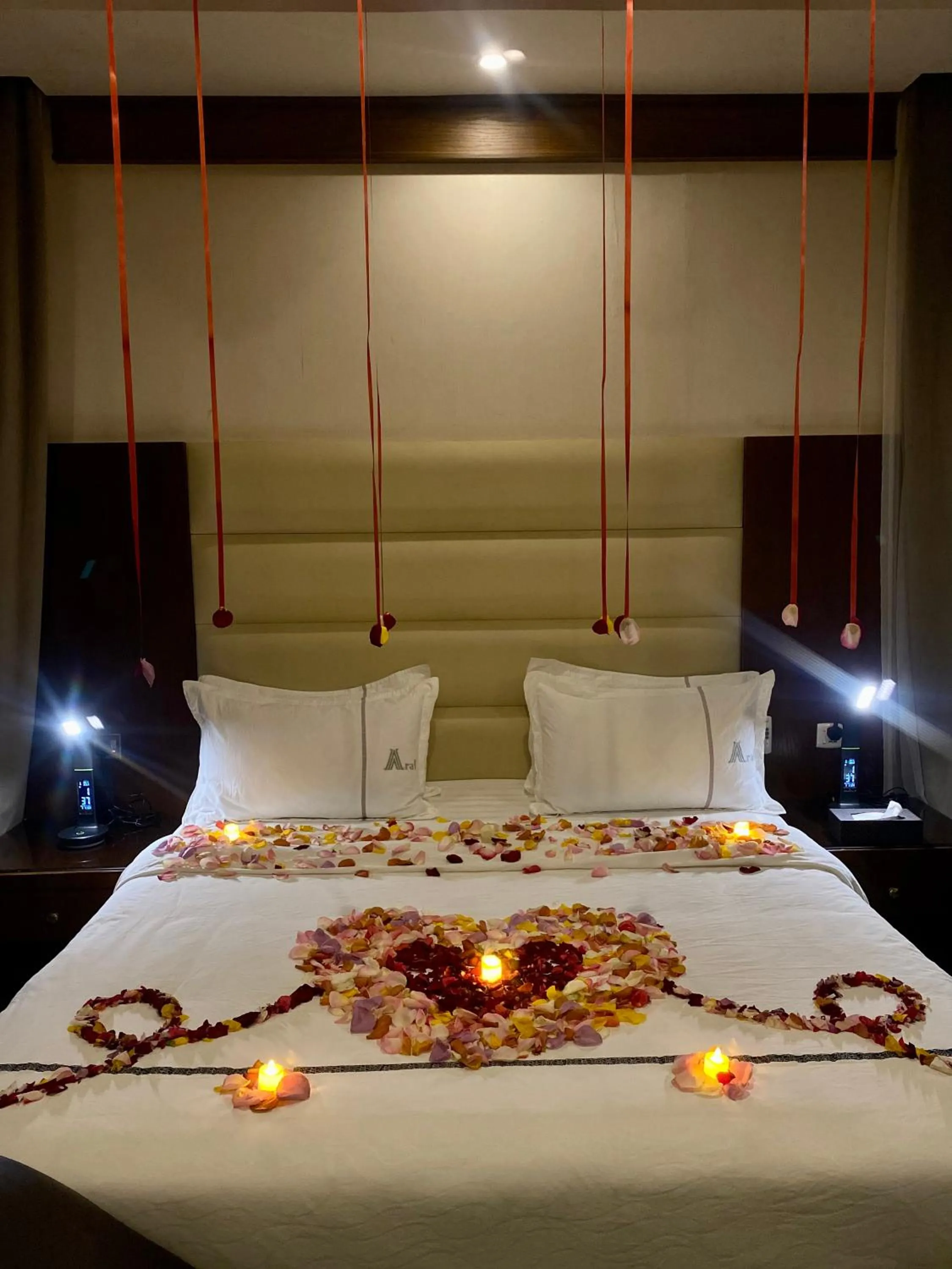 Bed in Aral Hotel Apartments