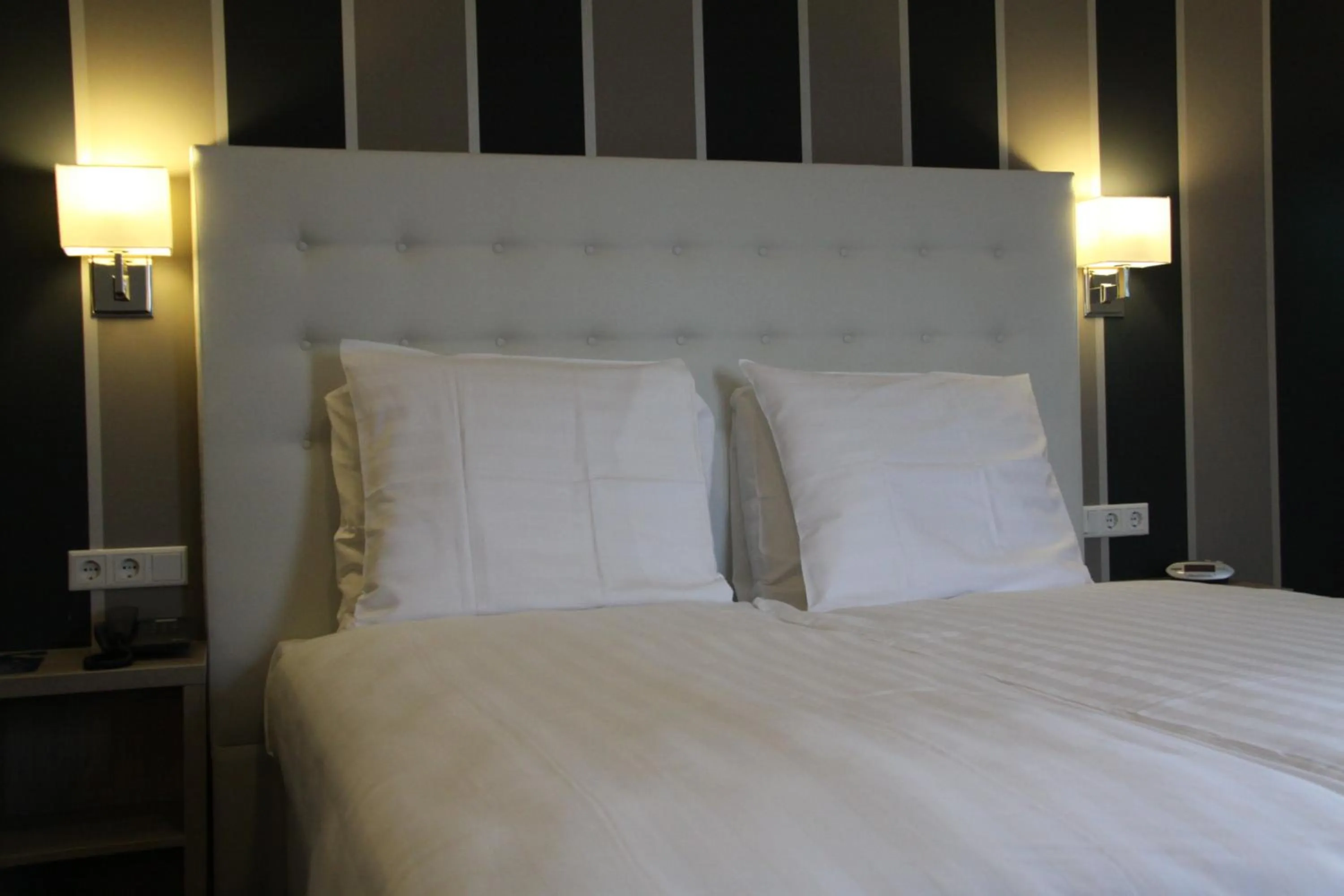 Bed in Fletcher Hotel-Restaurant Duinzicht