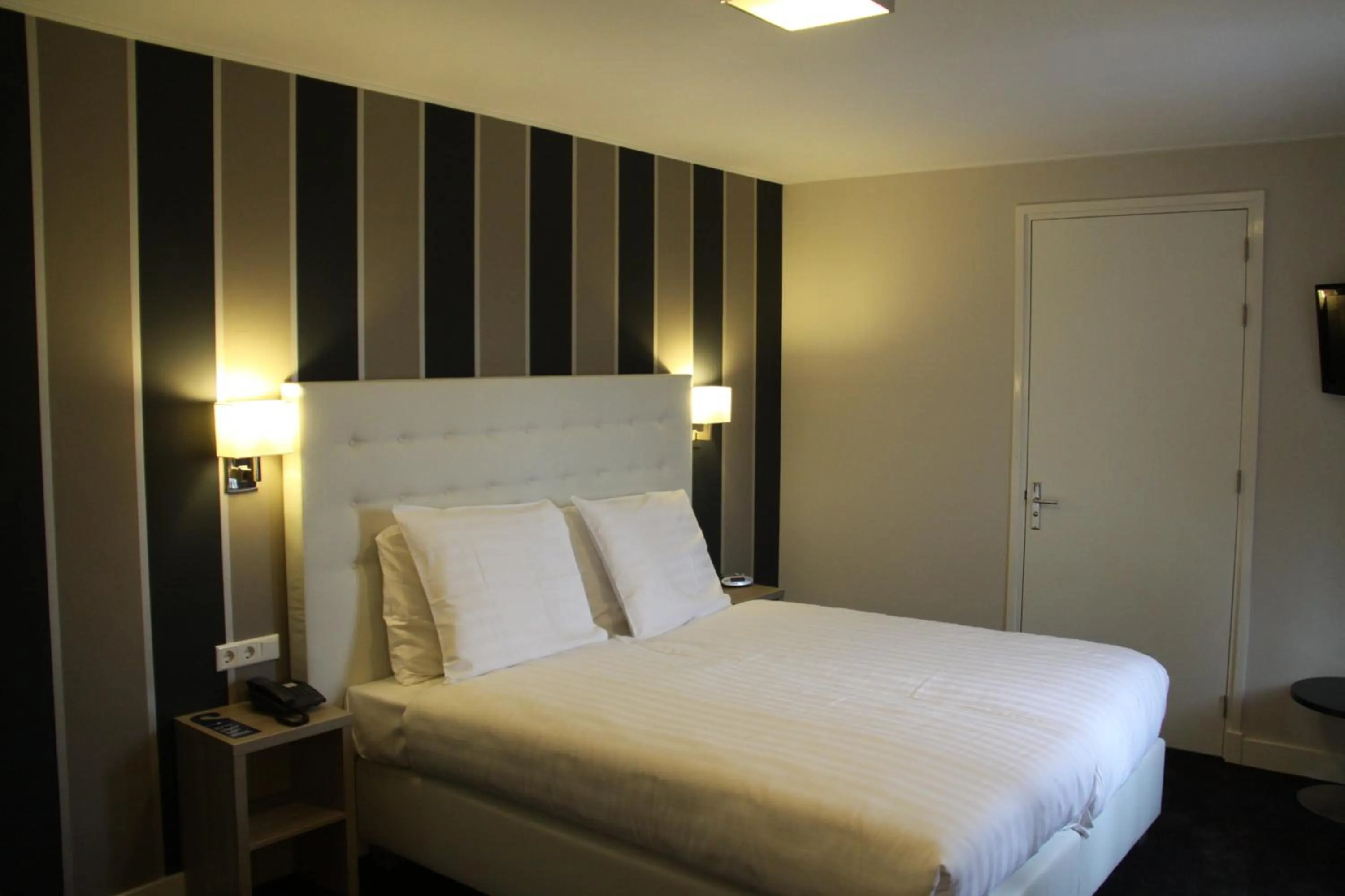 Bed in Fletcher Hotel-Restaurant Duinzicht