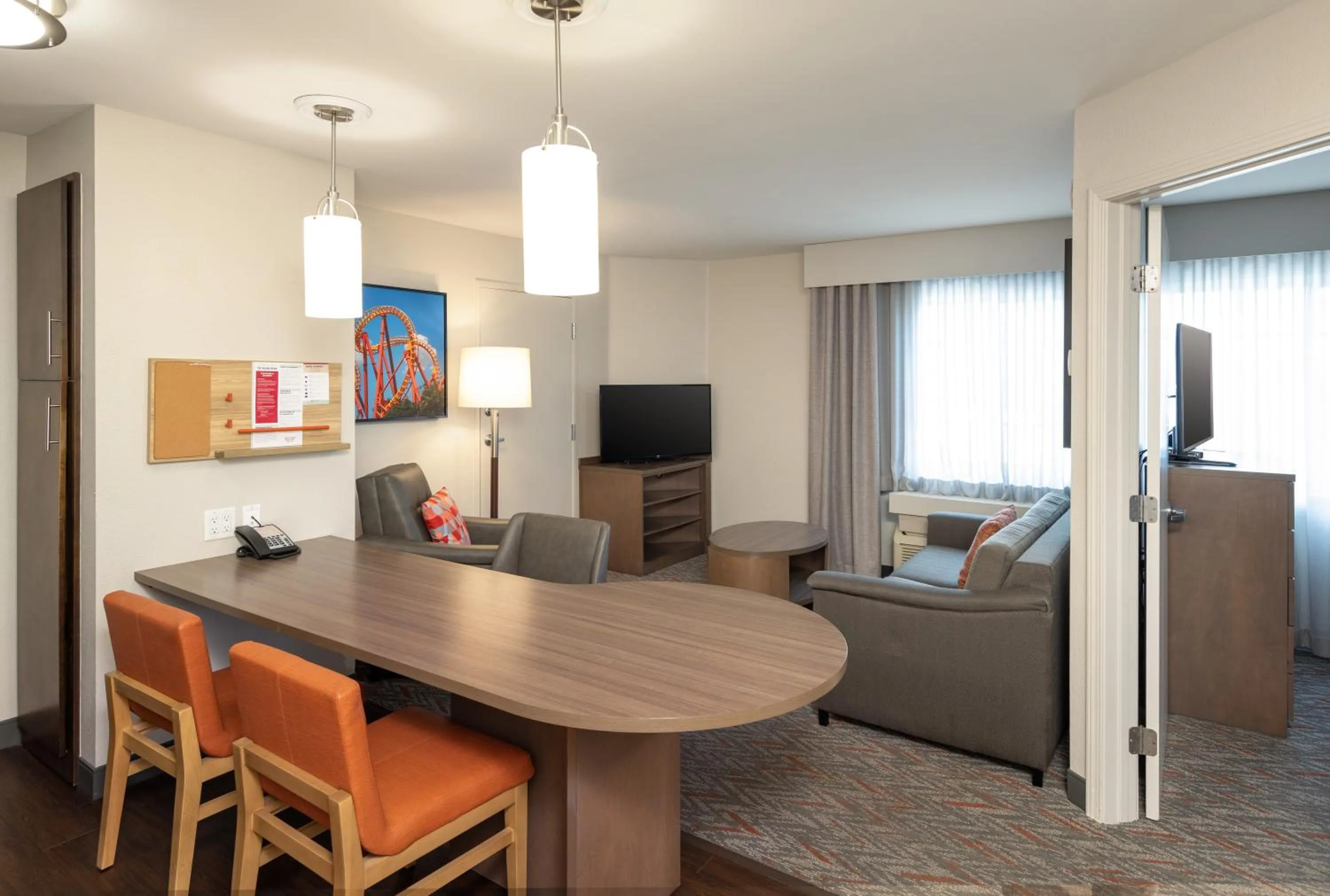 Living room in Candlewood Suites Anaheim - Resort Area by IHG