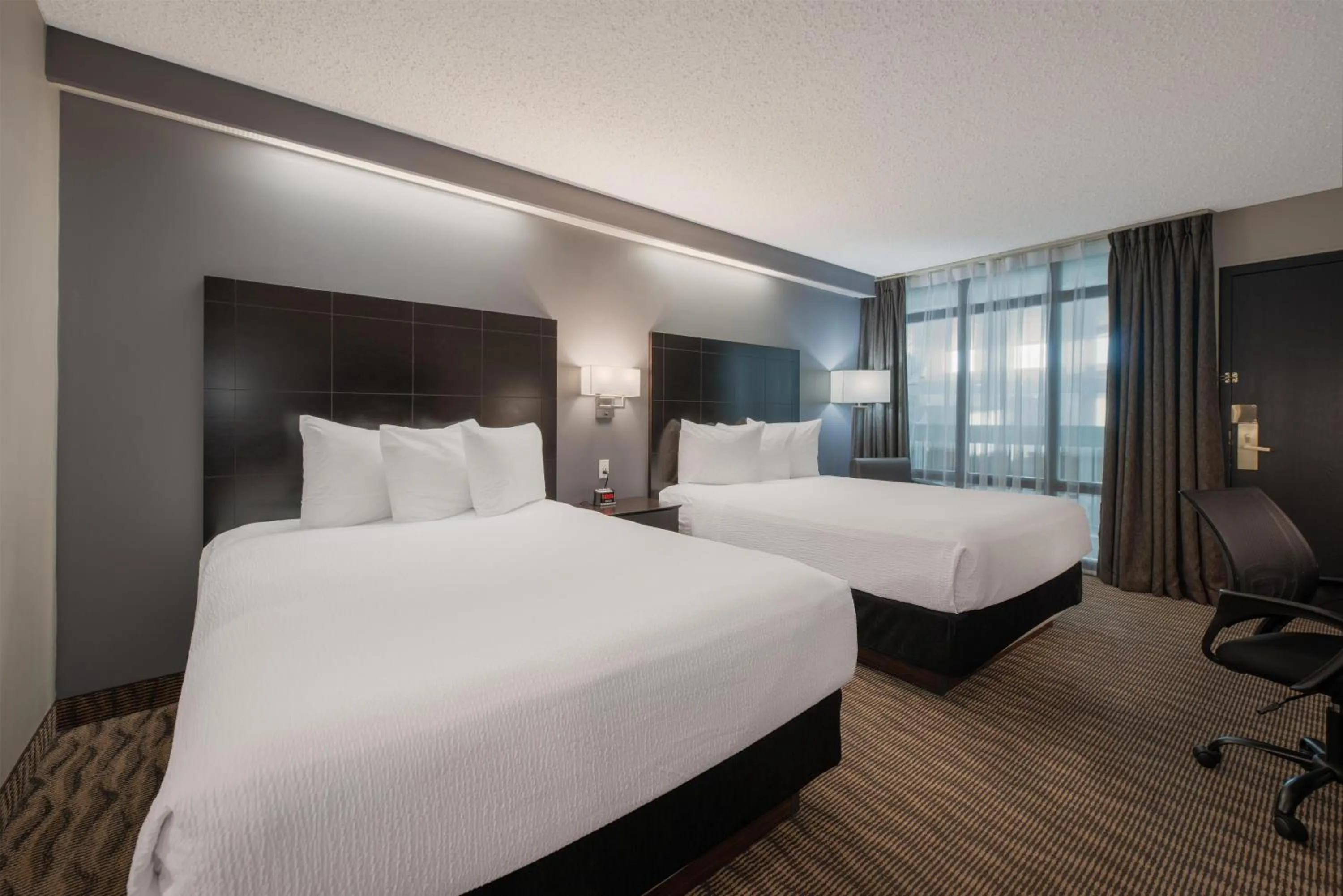 Bedroom, Bed in Coast Nisku Inn & Conference Centre