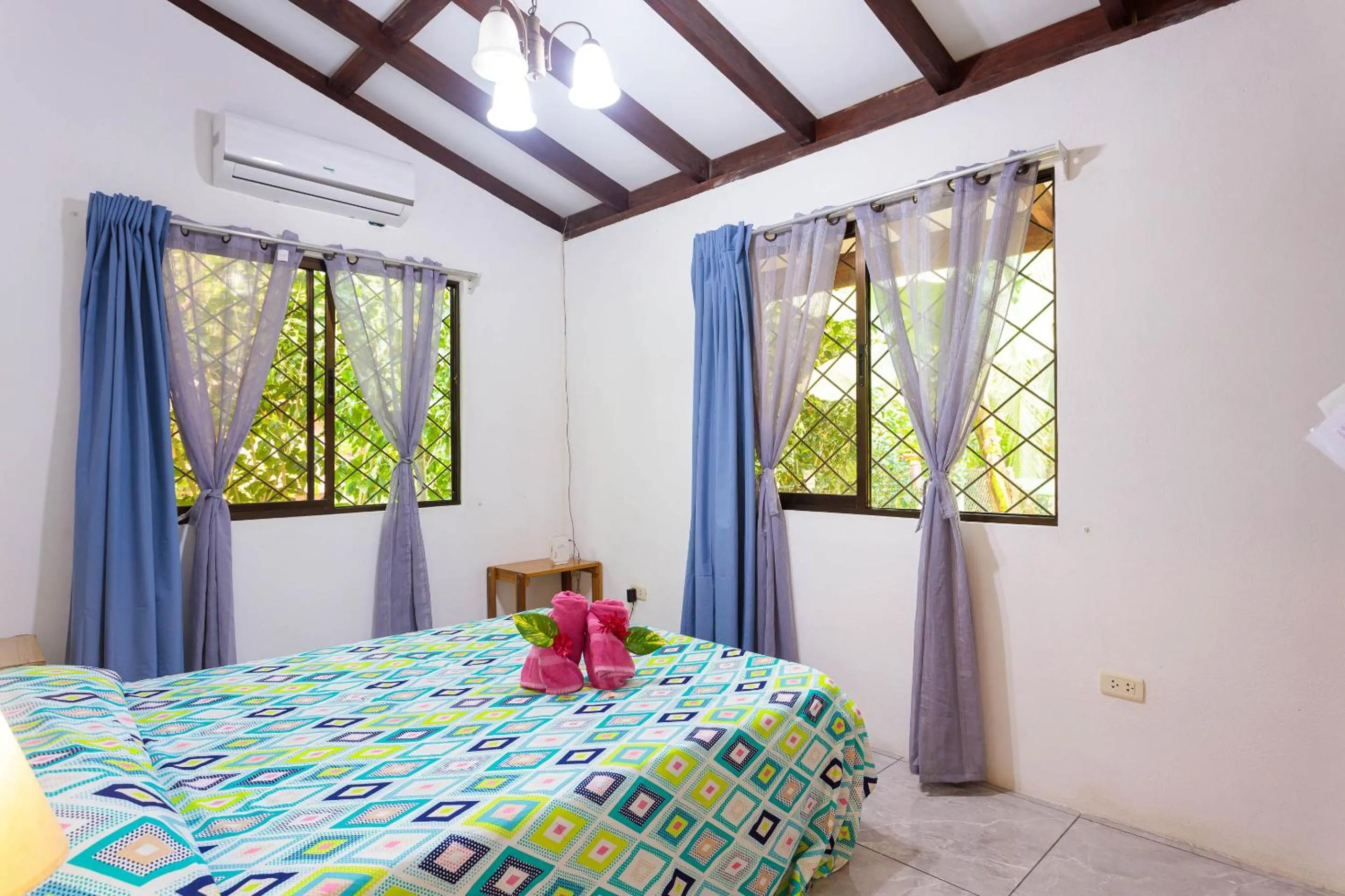 Bed in Bungalows Ache Cozy House