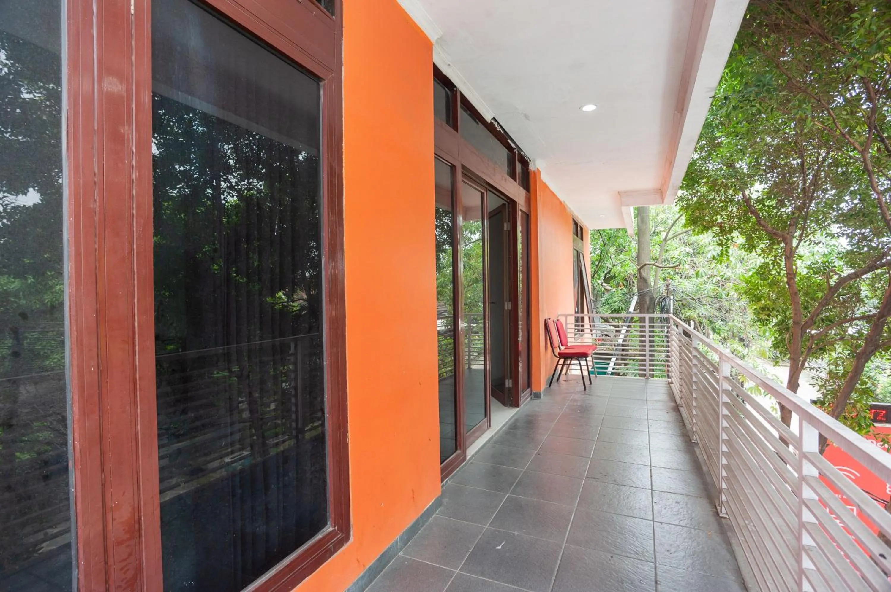 Balcony/Terrace in RedDoorz Syariah near Grand Galaxy Park