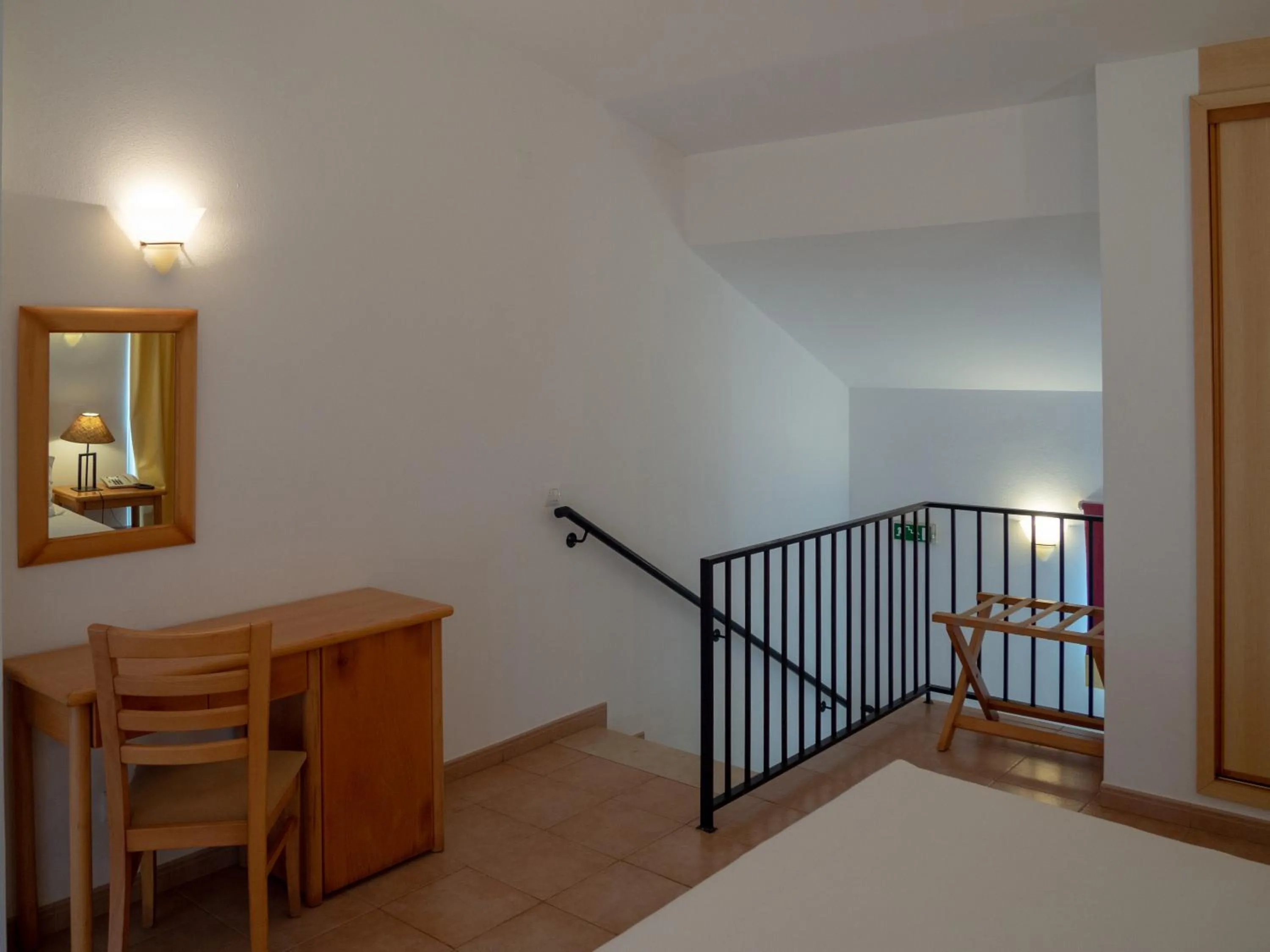 Bed in Luz Bay Hotel