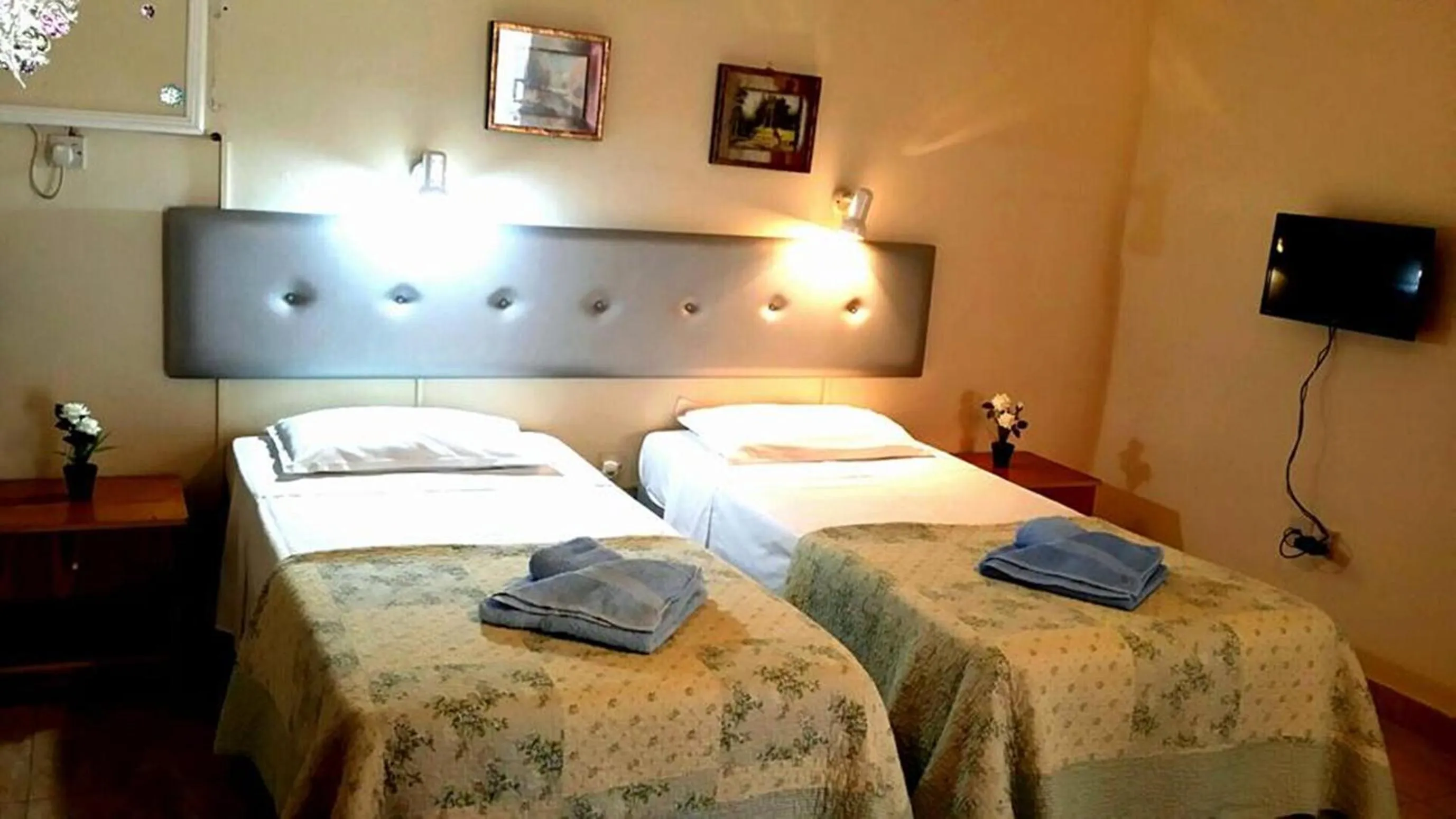 Bed in Florence Hotel Apartments