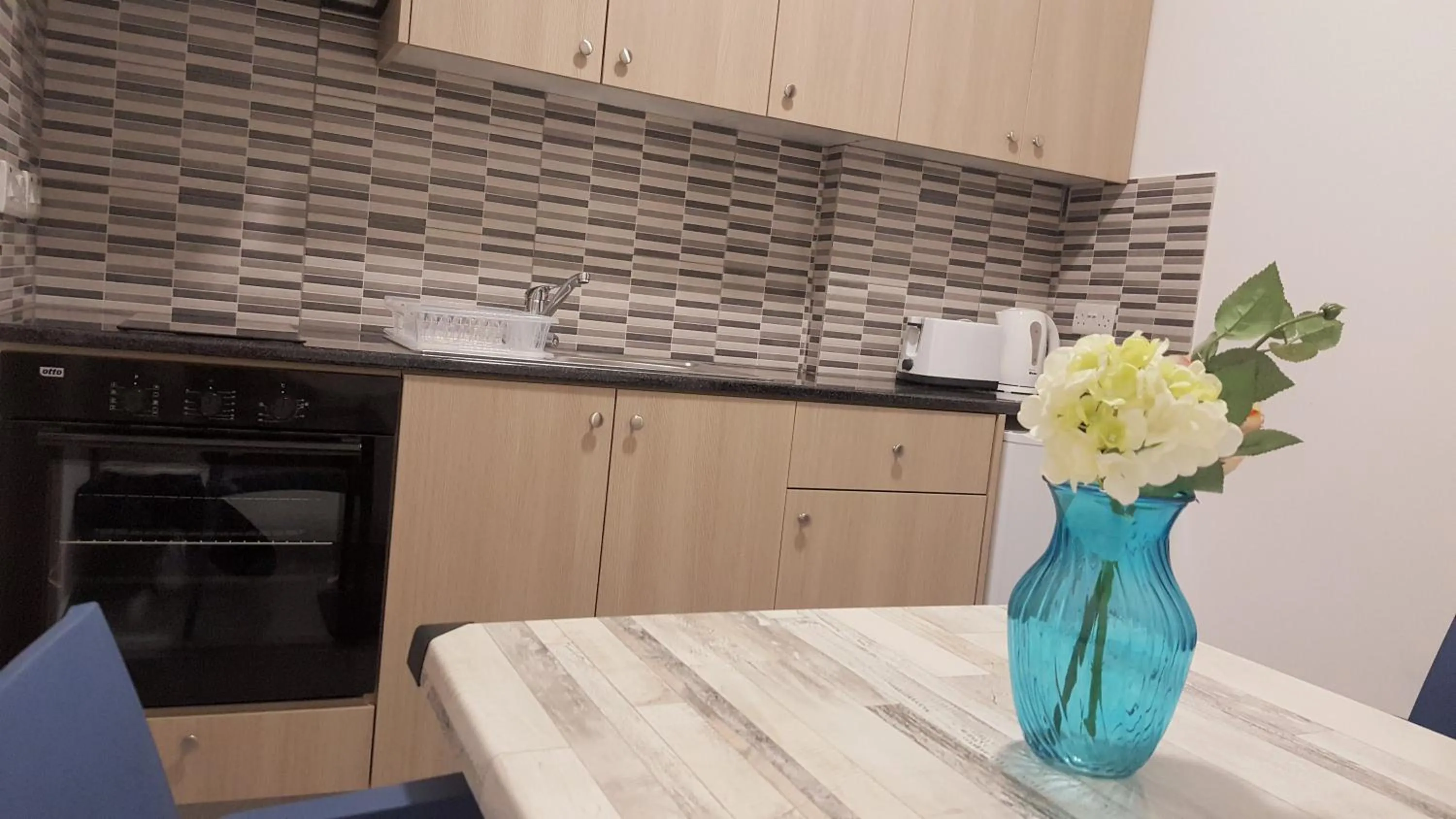 Kitchen or kitchenette in Florence Hotel Apartments