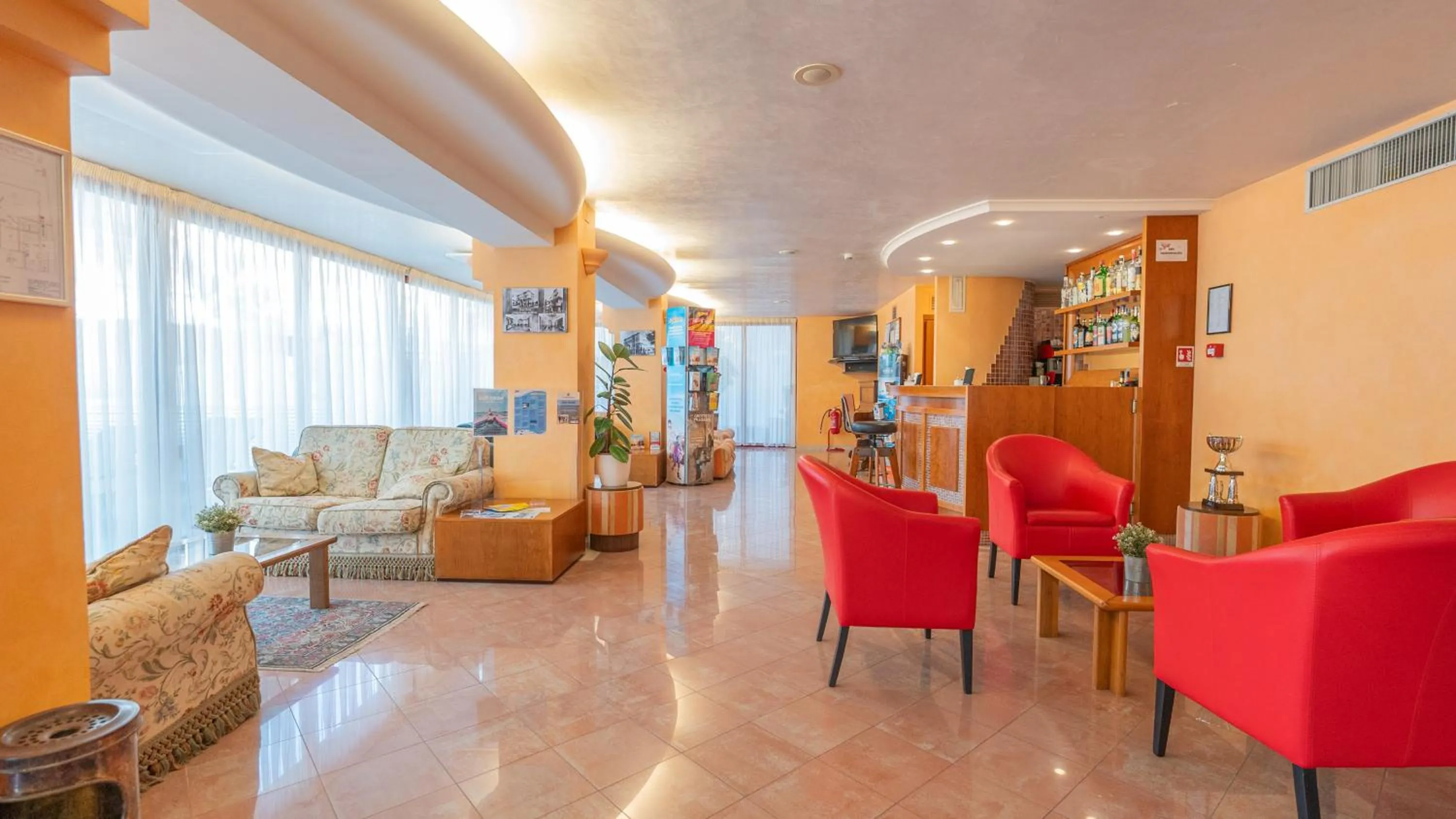 Communal lounge/ TV room in Hotel Nobel