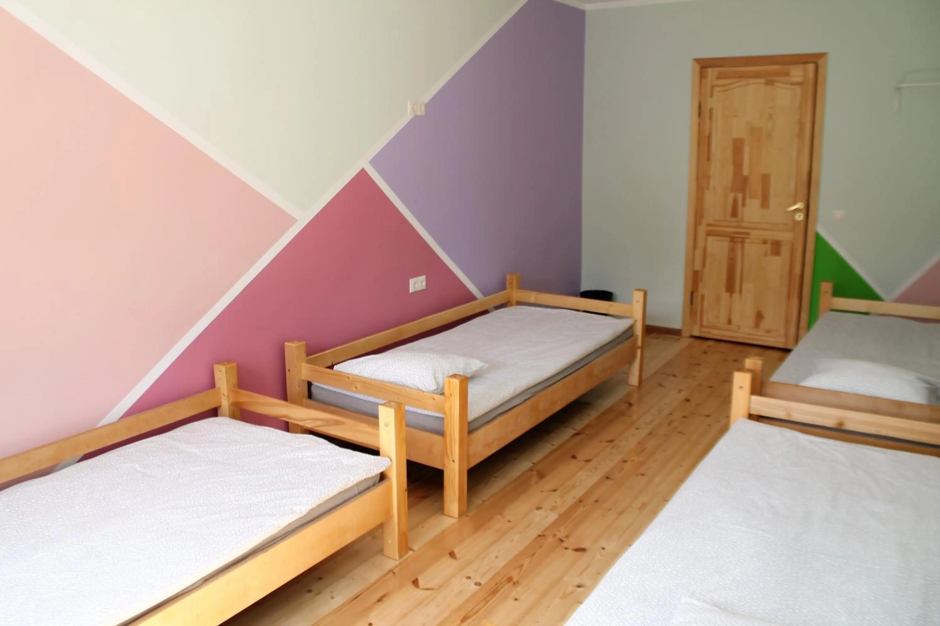 Bed in Liepu Hostelis