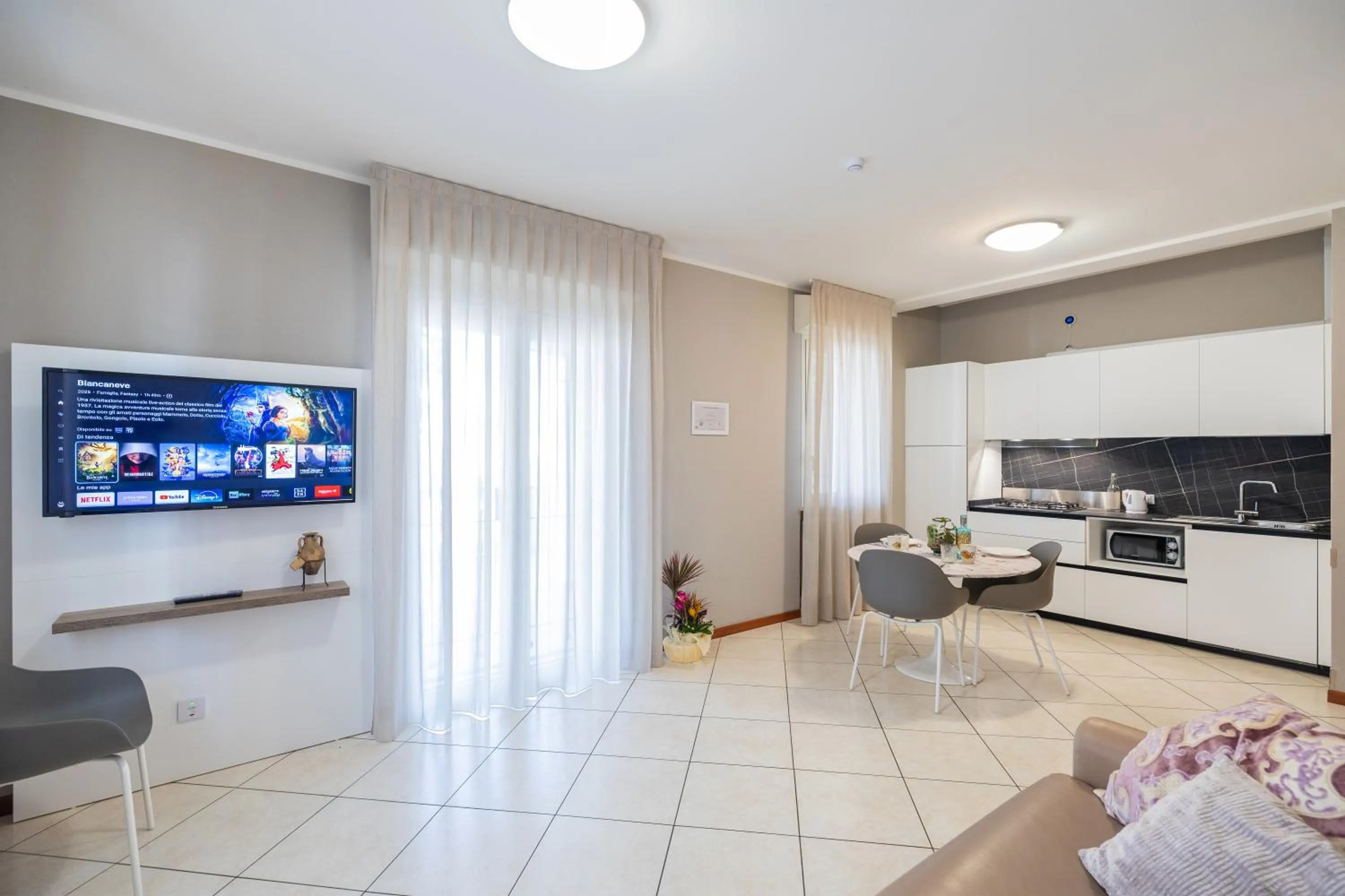 Communal lounge/ TV room in Residenza Mediterranea Apartments
