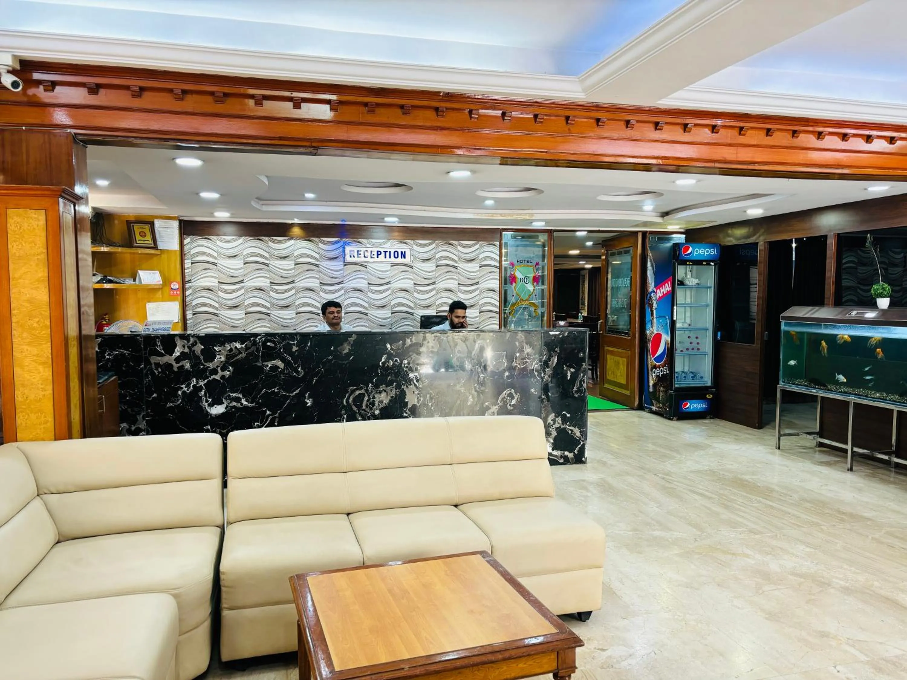 Communal lounge/ TV room in Hotel Chetan International